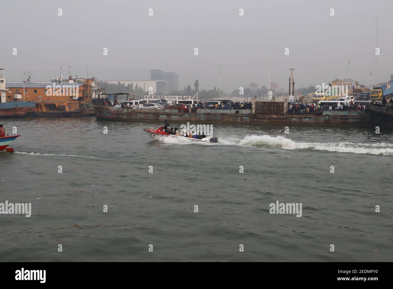 Bangladesh is a land of rivers. Water transport is one of the main  transport systems here. Lauch, Ferry, Boat and Speed boat is the main vehicle here. Stock Photo