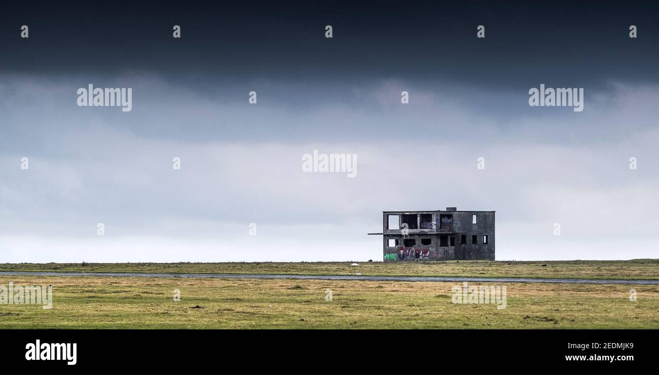 A panoramic view of the disused control tower on the historic WW2 RAF Davidstow Airfield on Bodmin Moor in Cornwall. Stock Photo