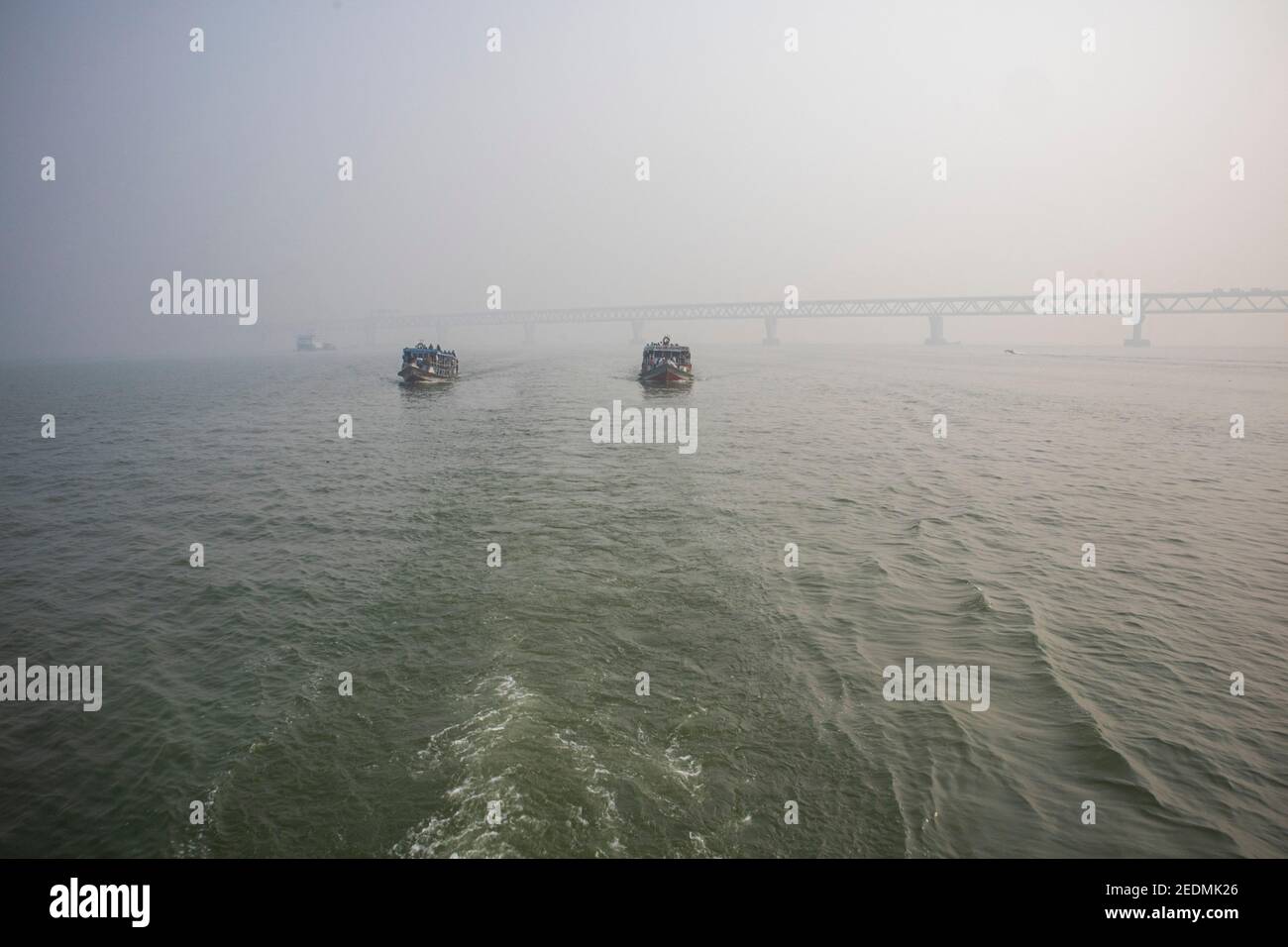 Bangladesh is a land of rivers. Water transport is one of the main  transport systems here. Lauch, Ferry, Boat and Speed boat is the main vehicle here. Stock Photo