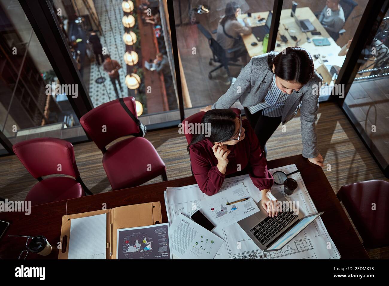 Two professional designers discussing their business project Stock Photo