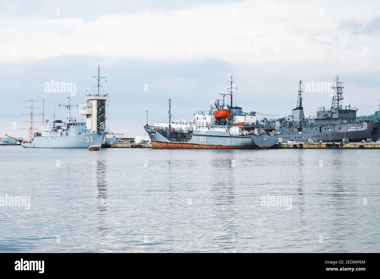 Varna, Bulgaria - July 16, 2014: Bunkering vessel Balchik 203 and Tripartite-class minehunter hull number 32 of Bulgarian Navy stand at Varna naval ba Stock Photo
