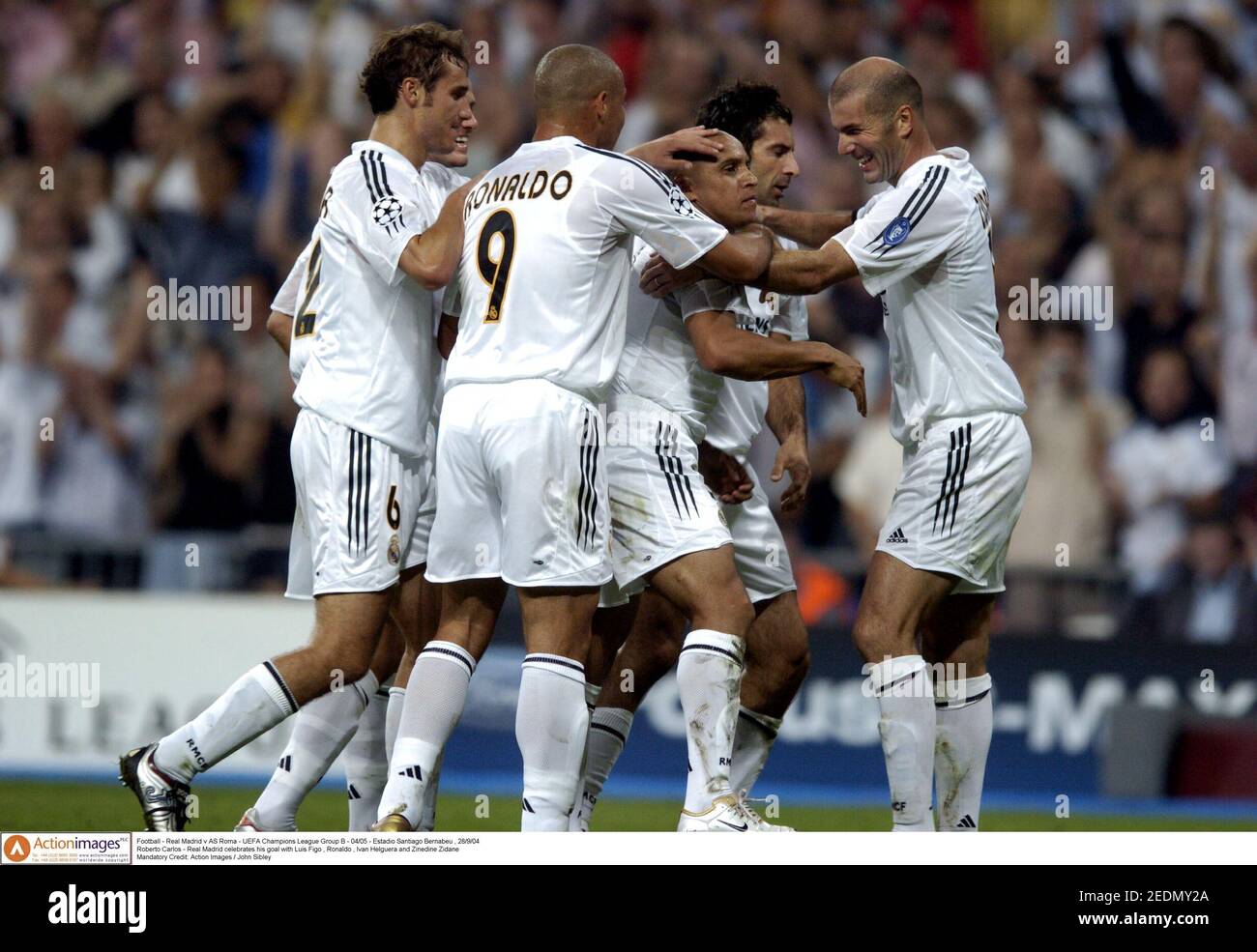 Football Real Madrid V As Roma Uefa Champions League Group B 04 05 Estadio Santiago Bernabeu 28 9 04 Roberto Carlos Real Madrid Celebrates His Goal With Luis Figo Football Real Madrid V As Roma Uefa Champions League Group B 04 05 Estadio Santiago Bernabeu 28 9 04 Roberto Carlos Real Madrid Celebrates His Goal With Luis Figo