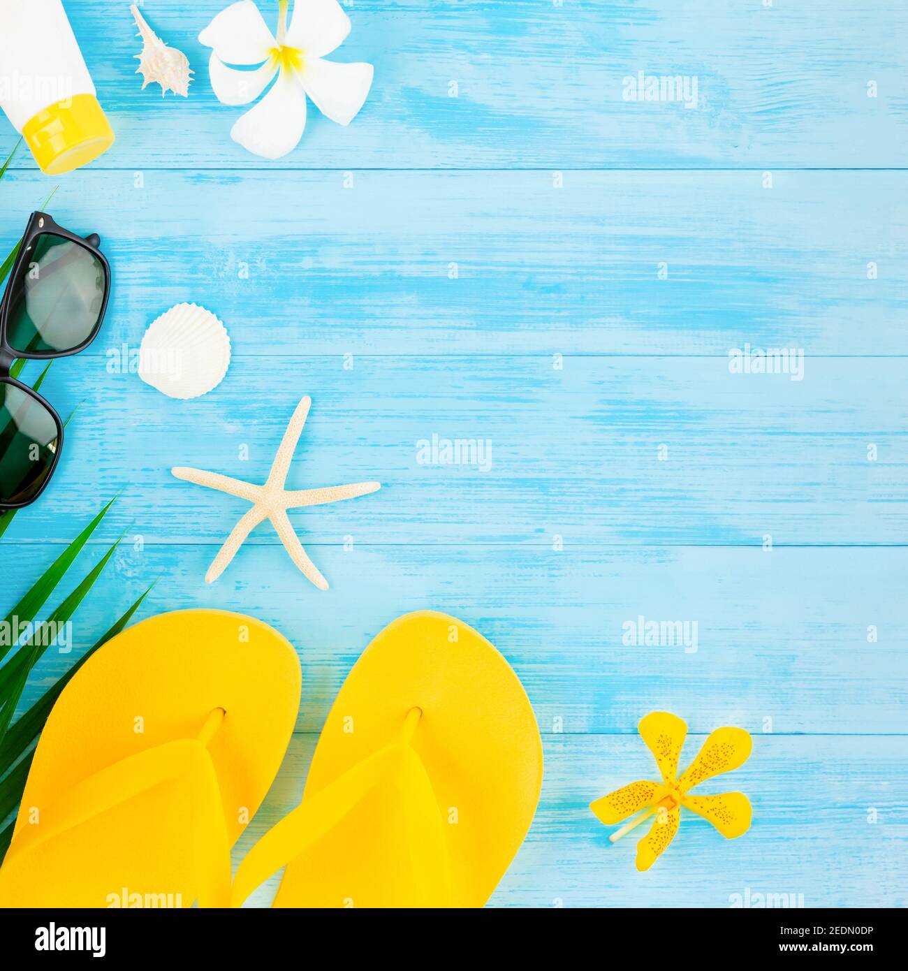 Colorful summer holiday beach background with accessories on light blue ...