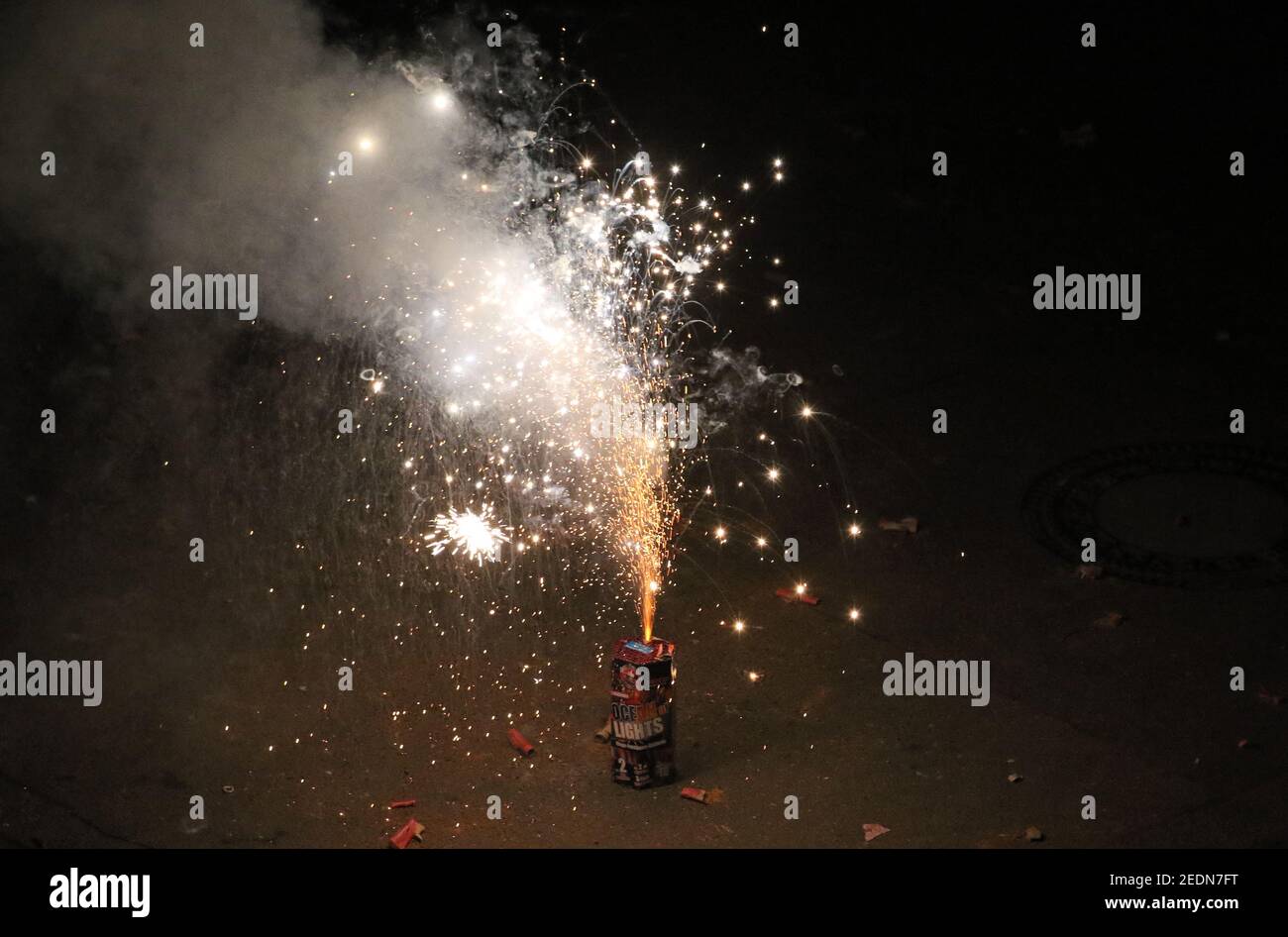 01.01.2020, Berlin, Rhineland-Palatinate, Germany - Ground fireworks on New Year's Eve on a street.. 00S200101D263CAROEX.JPG [MODEL RELEASE: NOT APPLI Stock Photo