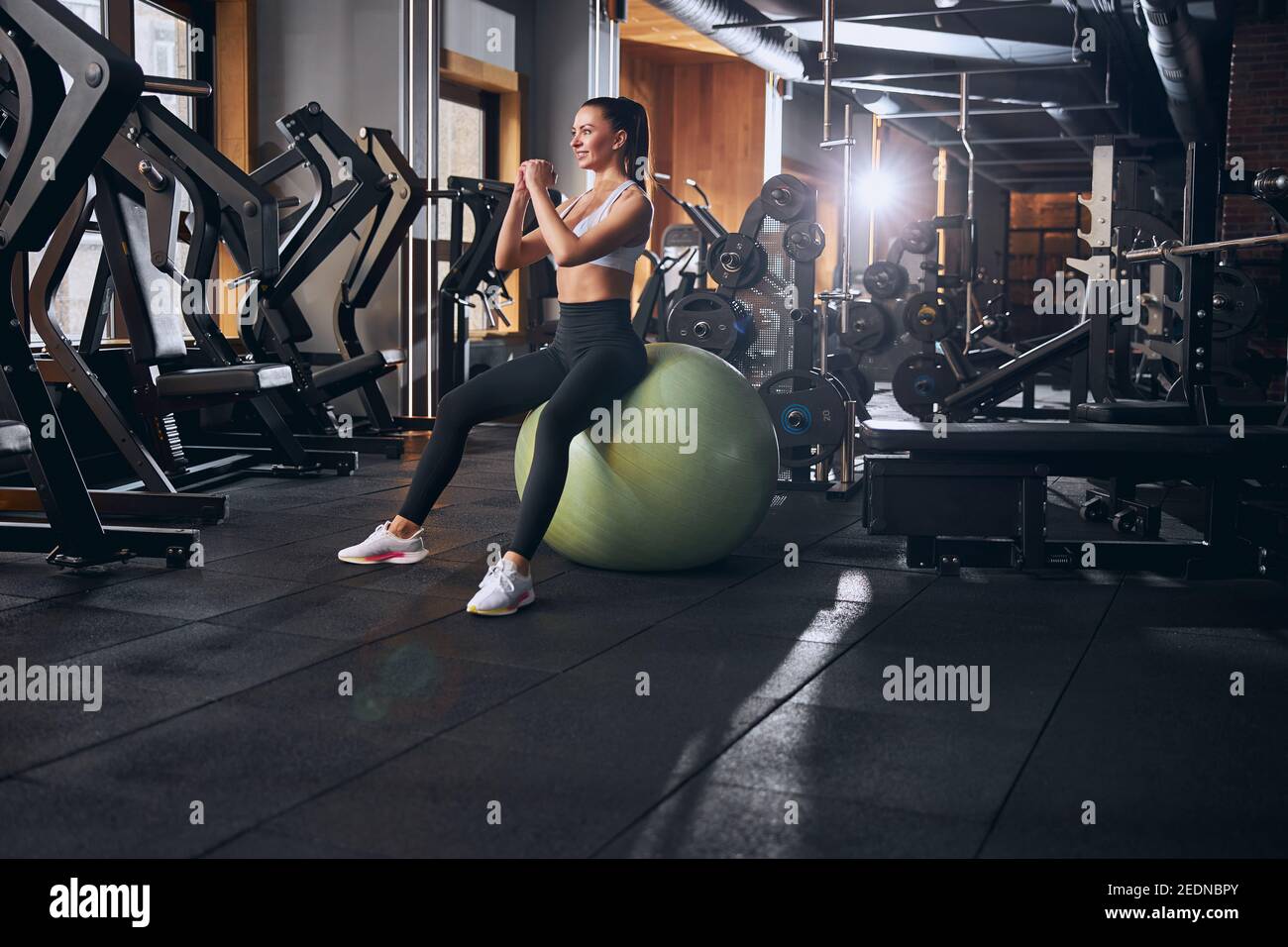 Large Fitball Woman on fitball gym hi-res stock photography and images - Alamy