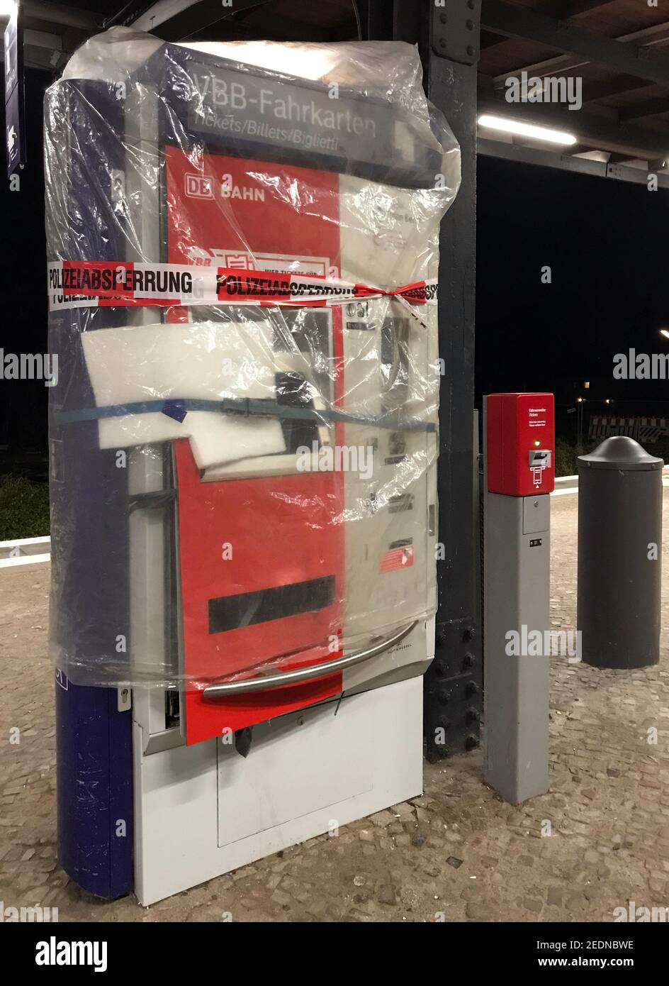 17.12.2020, Berlin, Berlin, Germany - Blown-up ticket vending machine at the Attilastrasse S-Bahn station has been secured by the police.. 00S201217D6 Stock Photo
