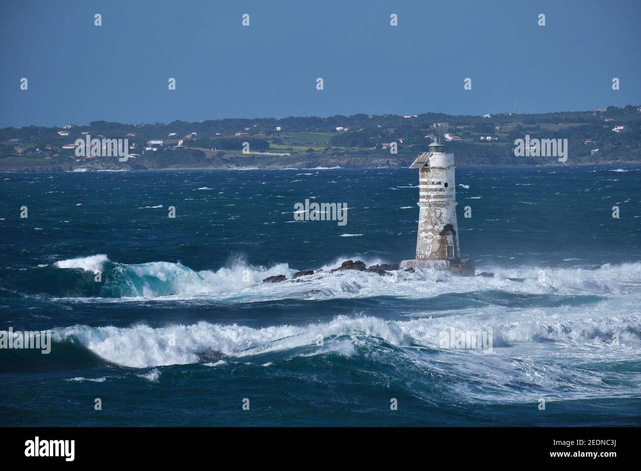 Faro mangiabarche, famous lighthouse in Calasetta, Sant Antioco, Sardinia, Italy Stock Photo