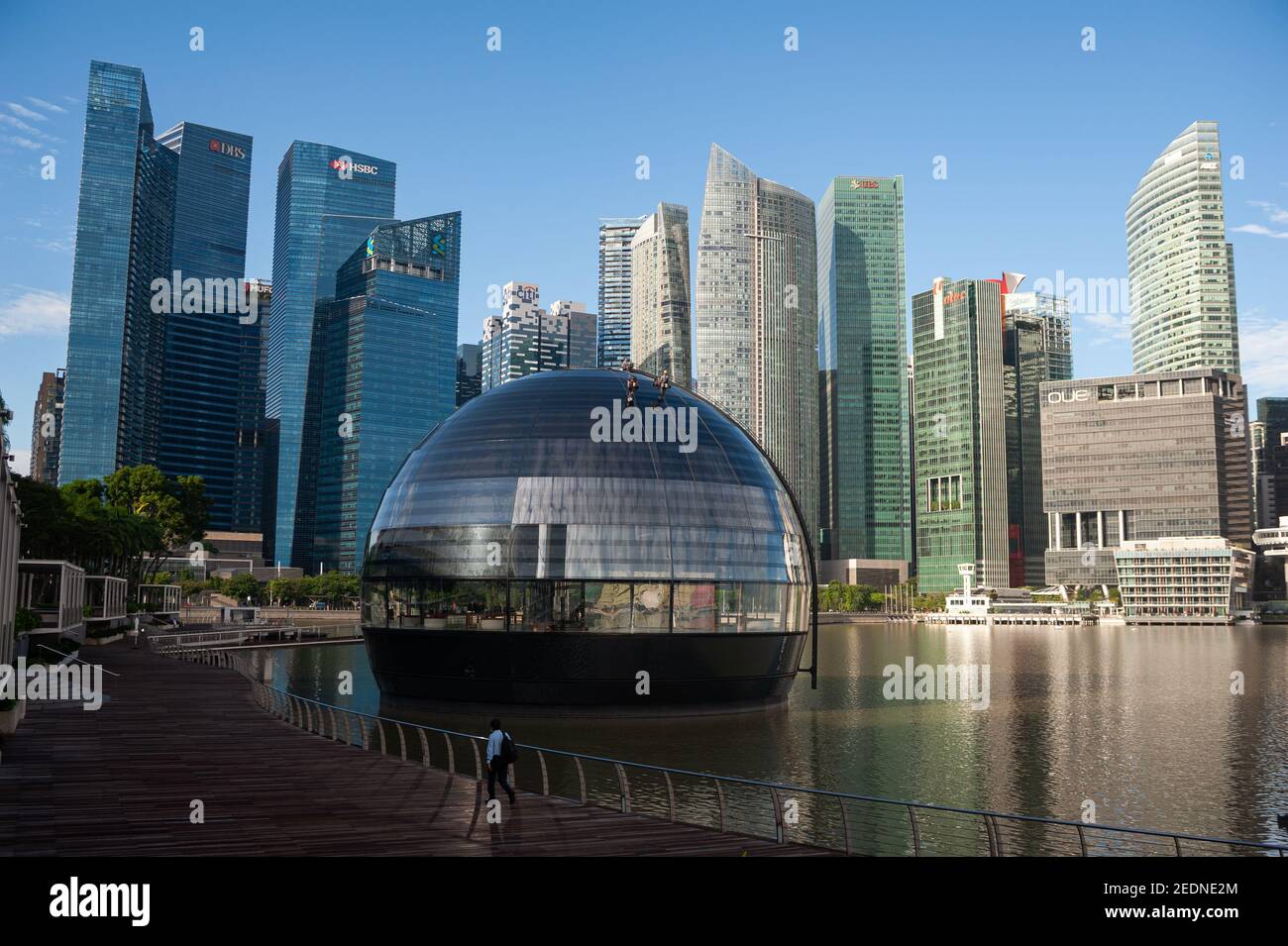 Aug. 28, 2020, Singapore, Republic of Singapore, Asia - View of the new  Apple flagship store on the waterfront in Marina Bay Sands with the  business district skyline in the background. The