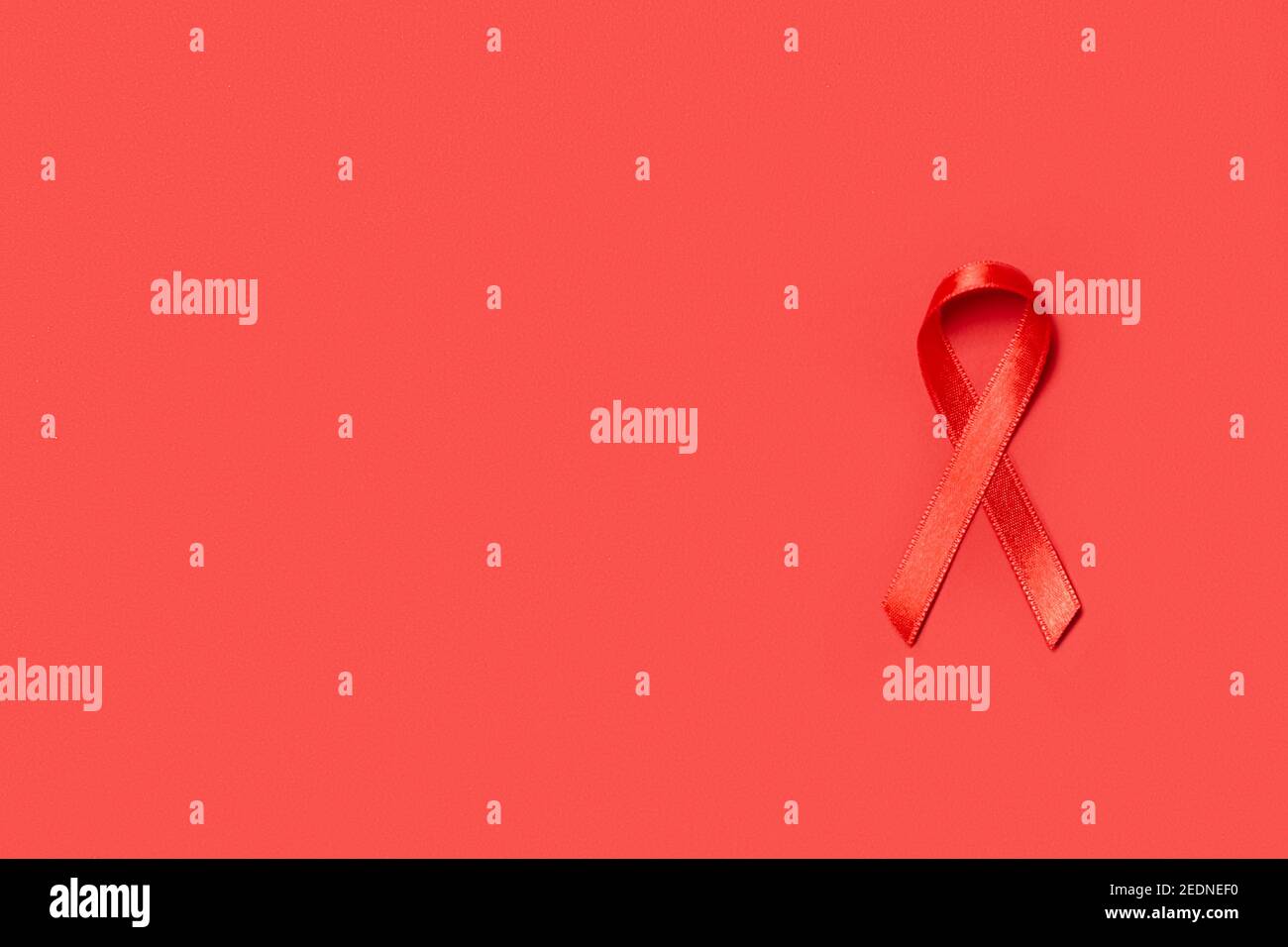 Red ribbon sign cancer hi-res stock photography and images - Alamy