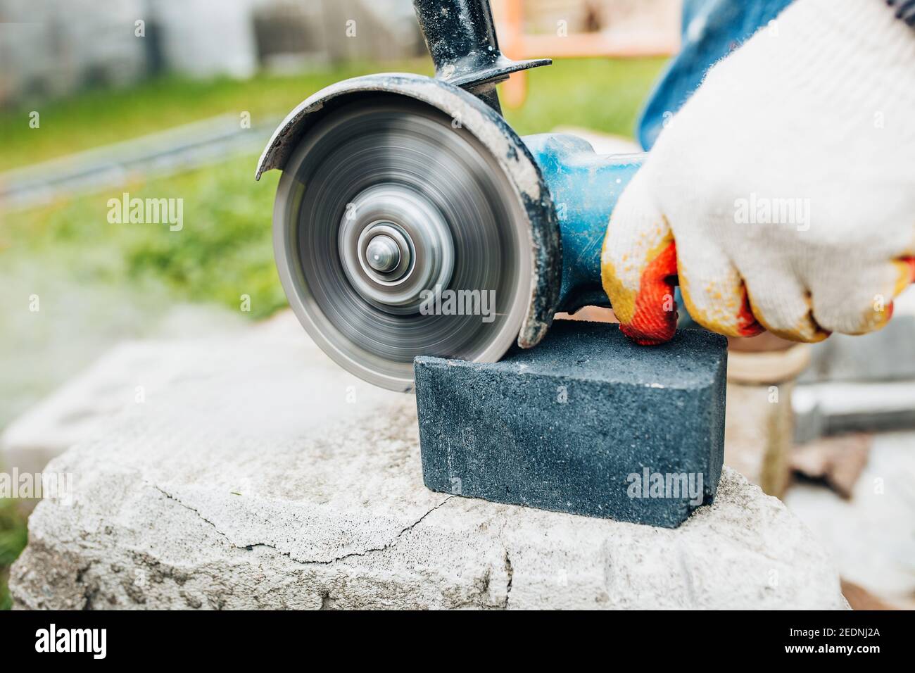 Stone cutter cutting granite slab hires stock photography and images Alamy