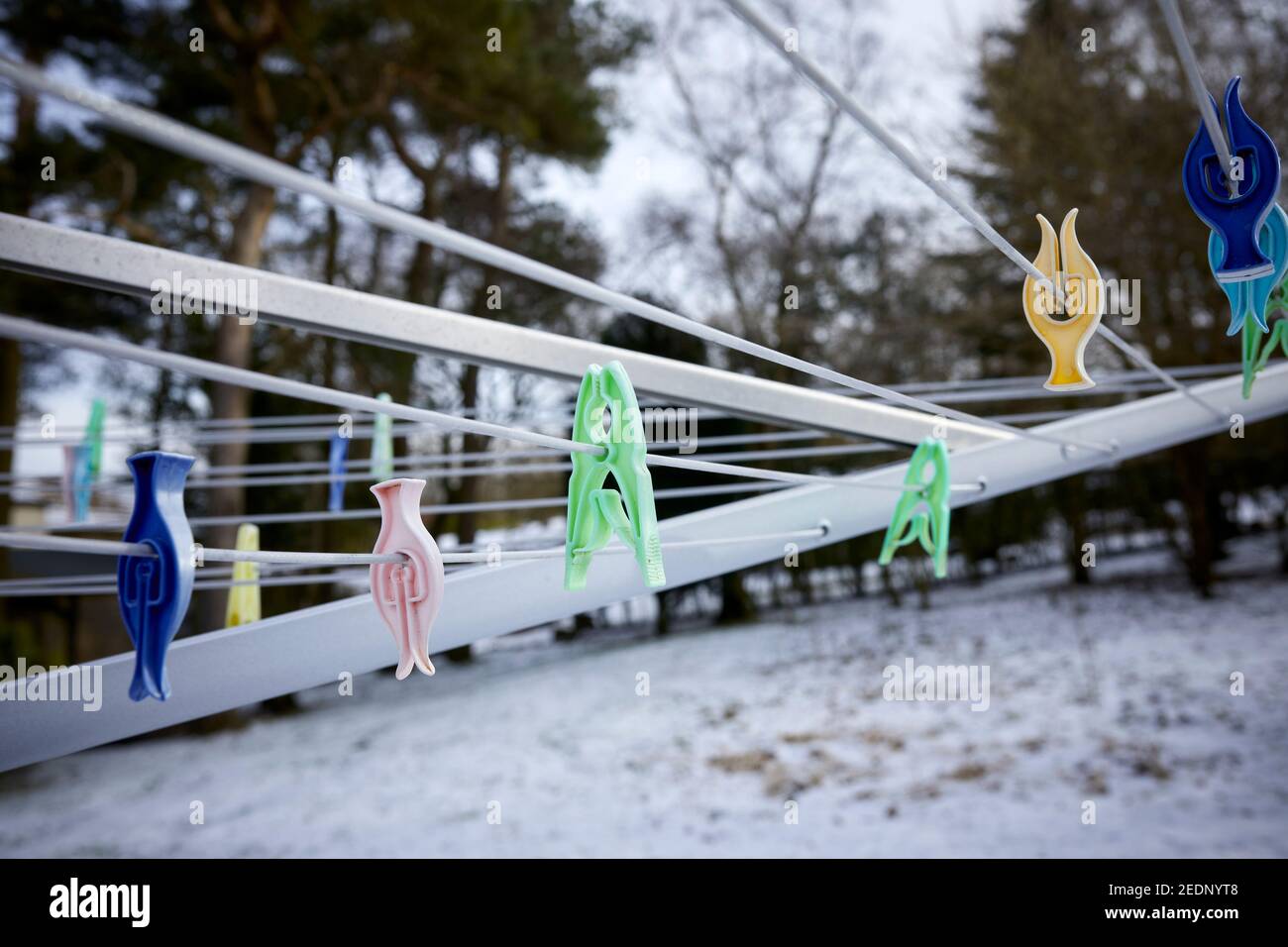 Garden washing line with clothes pegs in winter in the moorland smallholding Stock Photo
