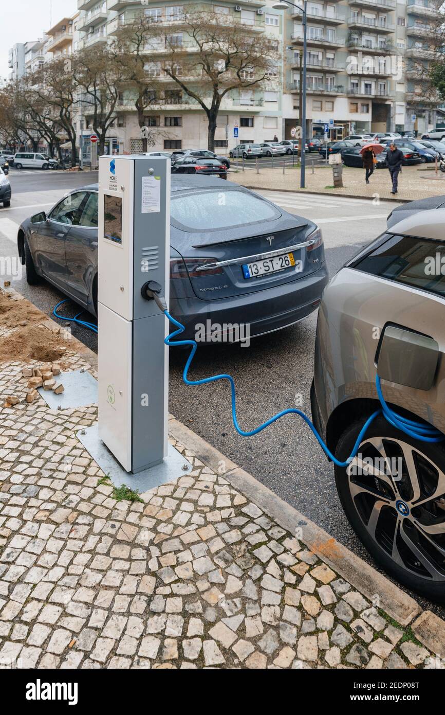 Lisbon, Portugal Feb 9, 2018 Two electric cars being charged at