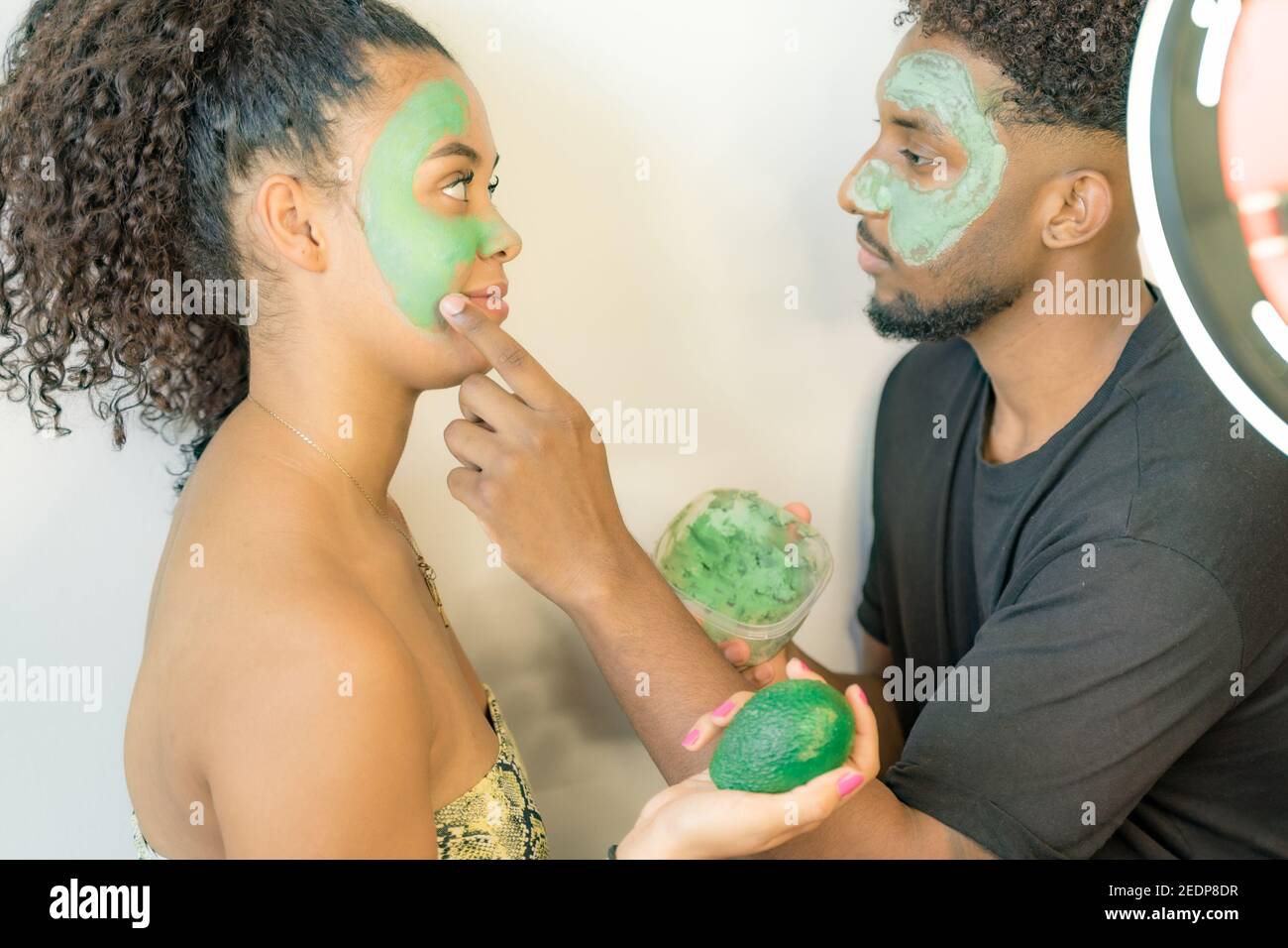 Boyfriend and girlfriend face mask hi-res stock photography and