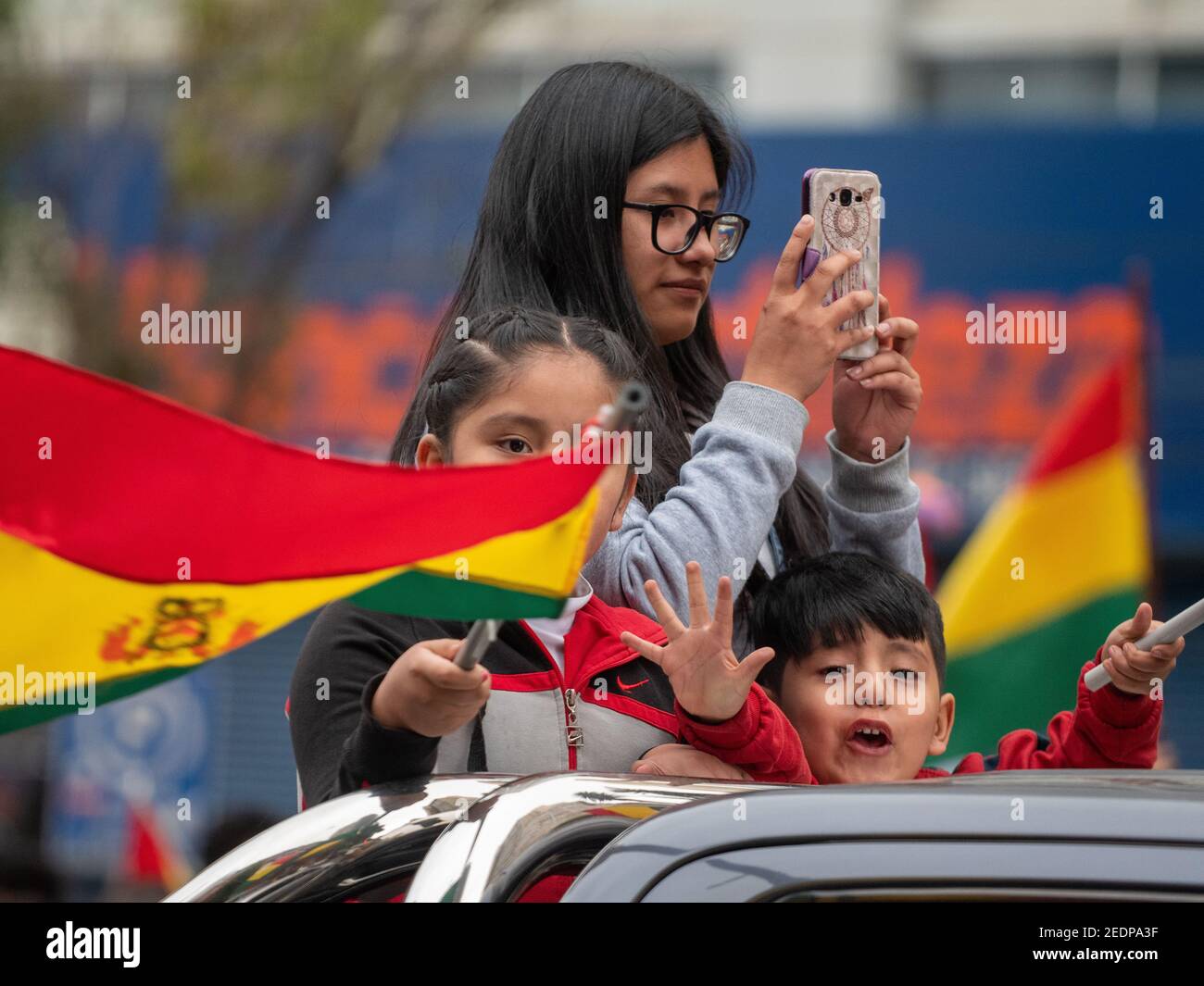 Young protestors join the celebrations following the resignation of Bolivian president Evo Morales in La Paz, Bolivia, on November 10, 2019. Stock Photo