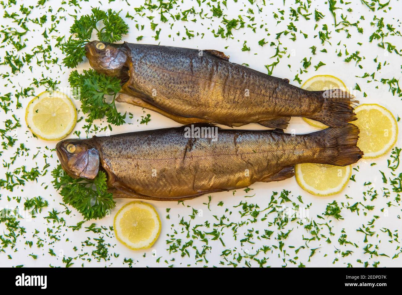 two fried trouts, fish dish Stock Photo