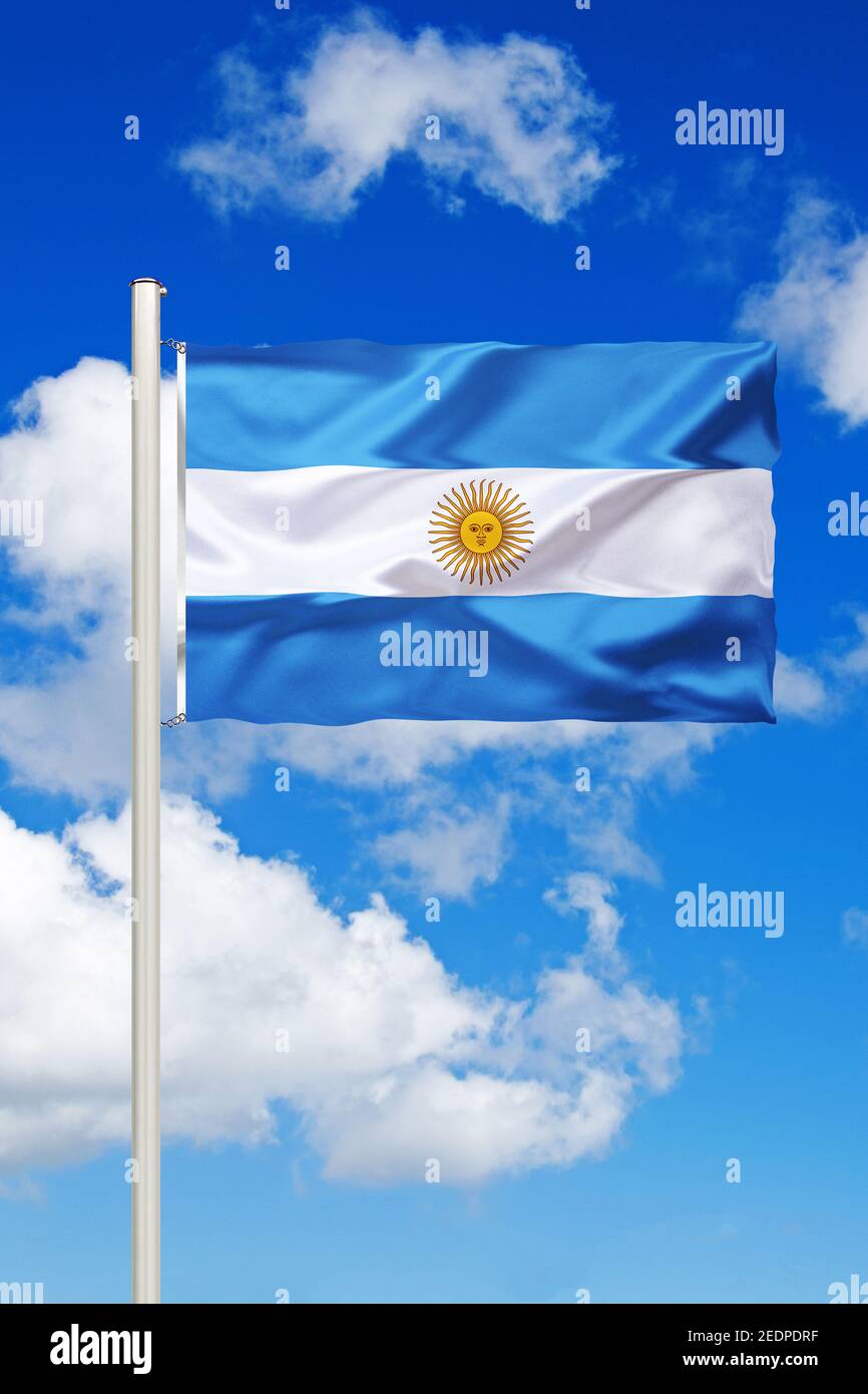 flag of Argentina against blue cloudy sky, Argentina Stock Photo