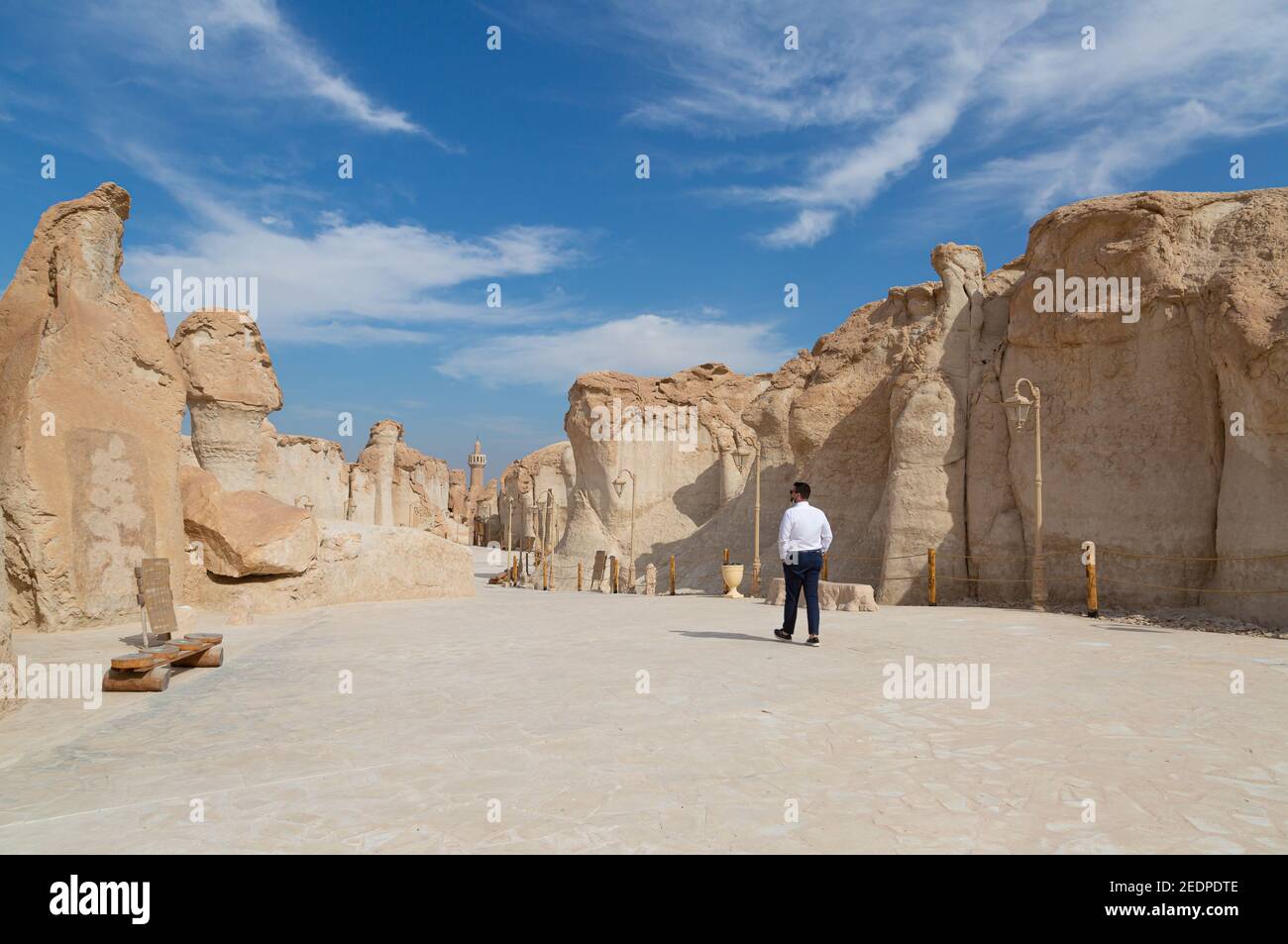 Lonely male tourist at Al Qarah Mountain in Eastern province of Saudi Arabia Stock Photo