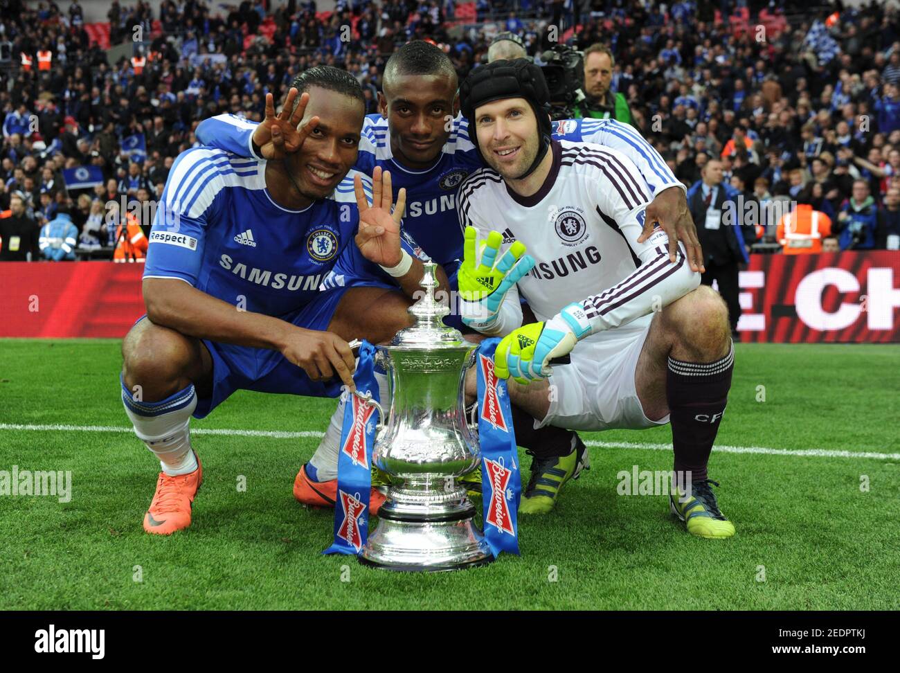 Football - Chelsea v Liverpool FA Cup Final - Wembley Stadium - 5/5/12  Chelsea's Didier Drogba (L), Salomon Kalou and Petr Cech (R) celebrate with  the FA Cup trophy after winning the