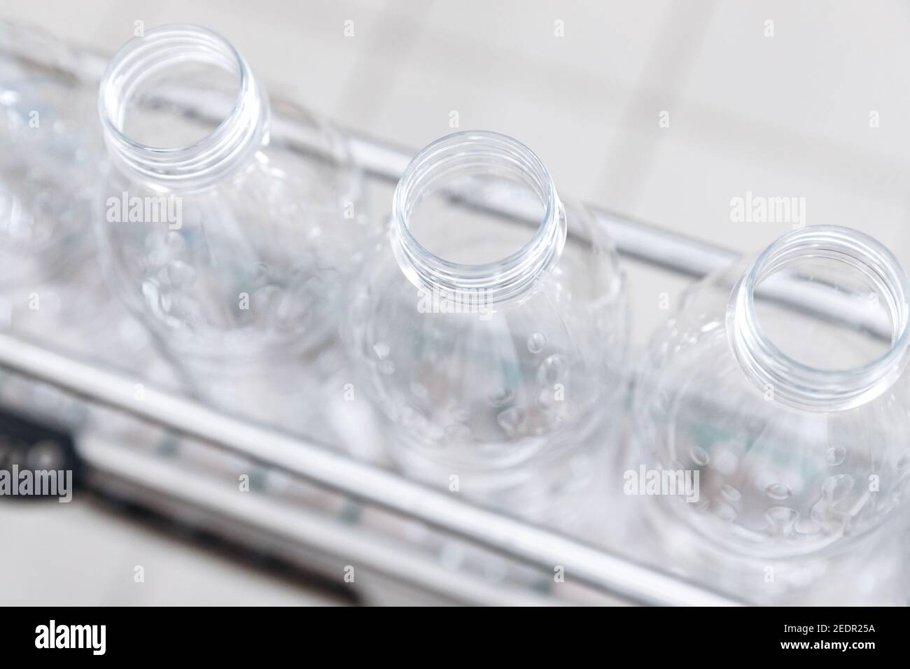 Production of PET plastic bottles on conveyor belt water and milk dairy