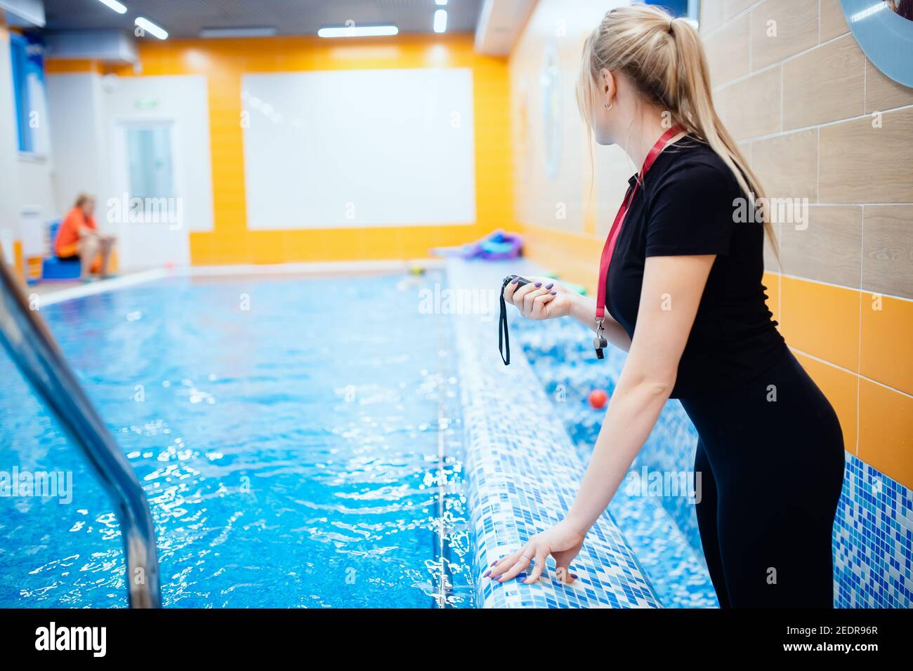 Swimming instructor coach people, woman hold in hand stopwatch during