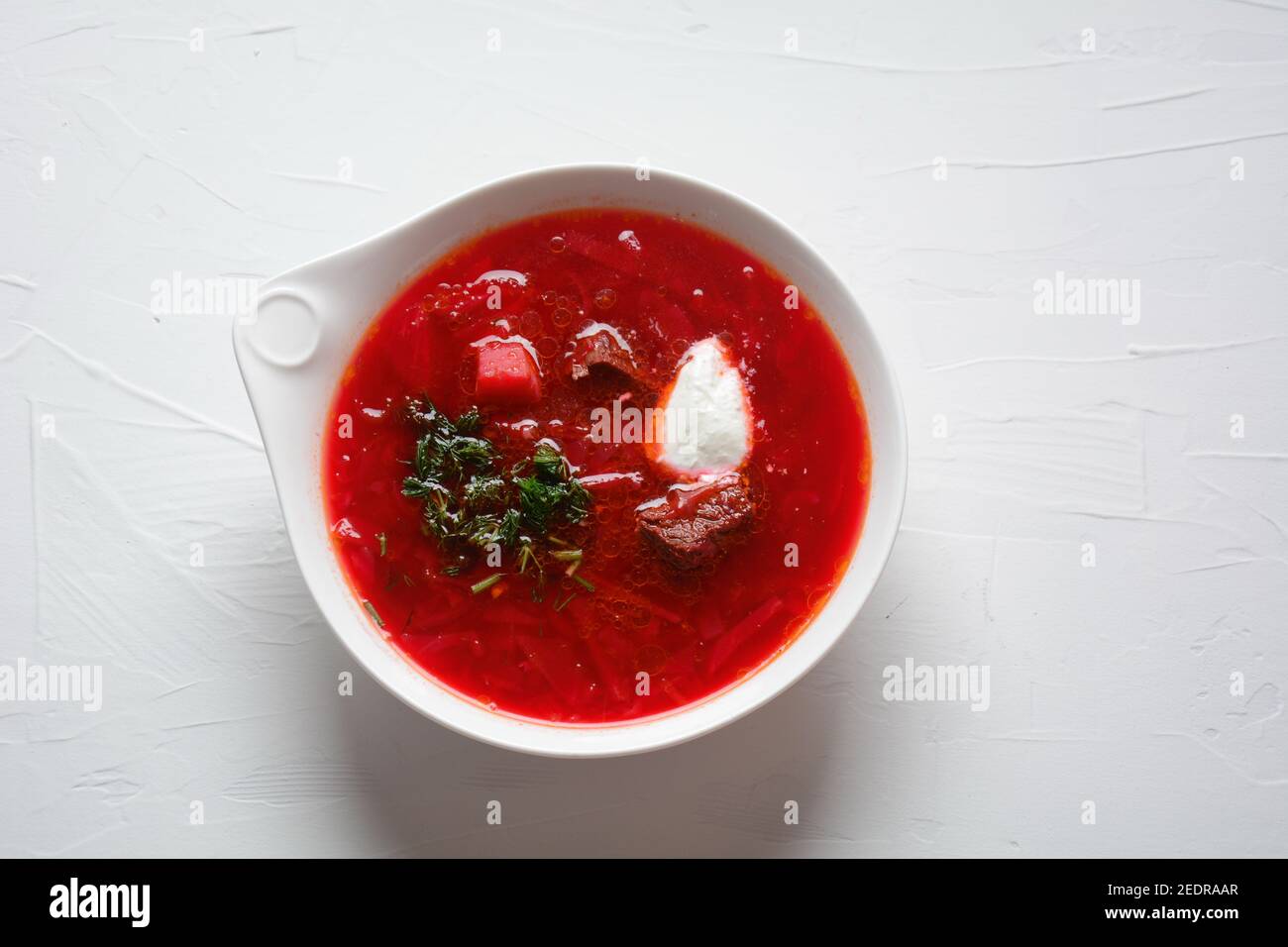 Traditional Ukrainian Russian borscht . Bowl of red beet root soup ...
