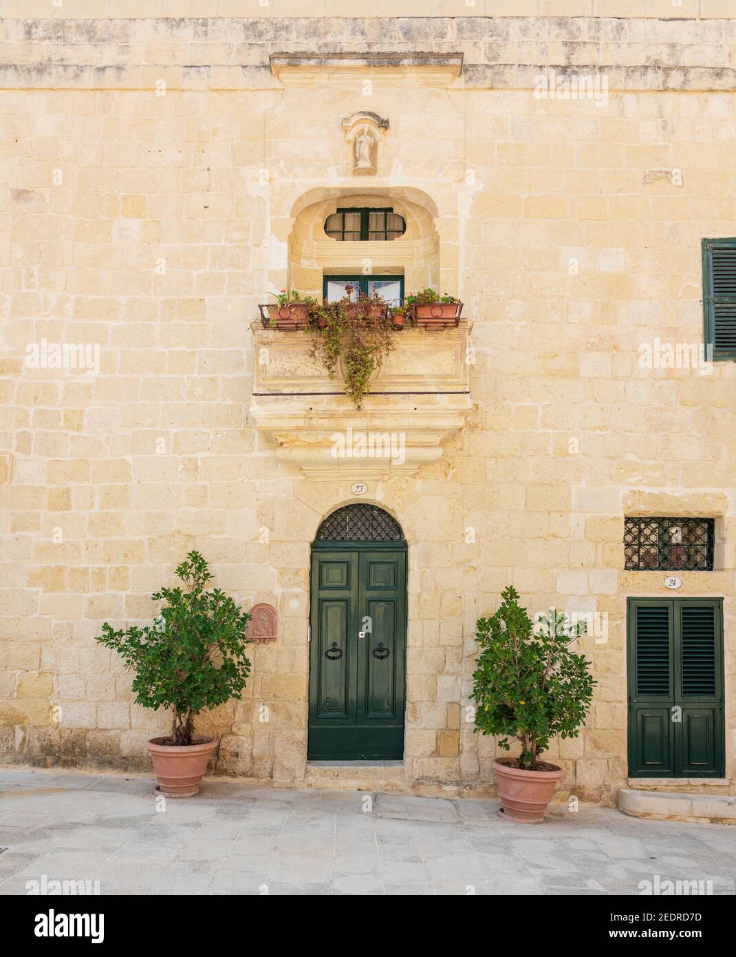 Maltese house frontage with green door in Mdina Malta Stock Photo