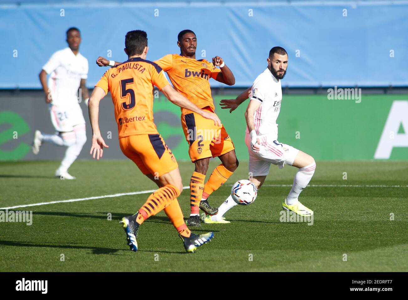 Karim Benzema of Real Madrid and Thierry Correia, Gabriel Paulista of Valencia in action during the Spanish championship La Lig / LM Stock Photo
