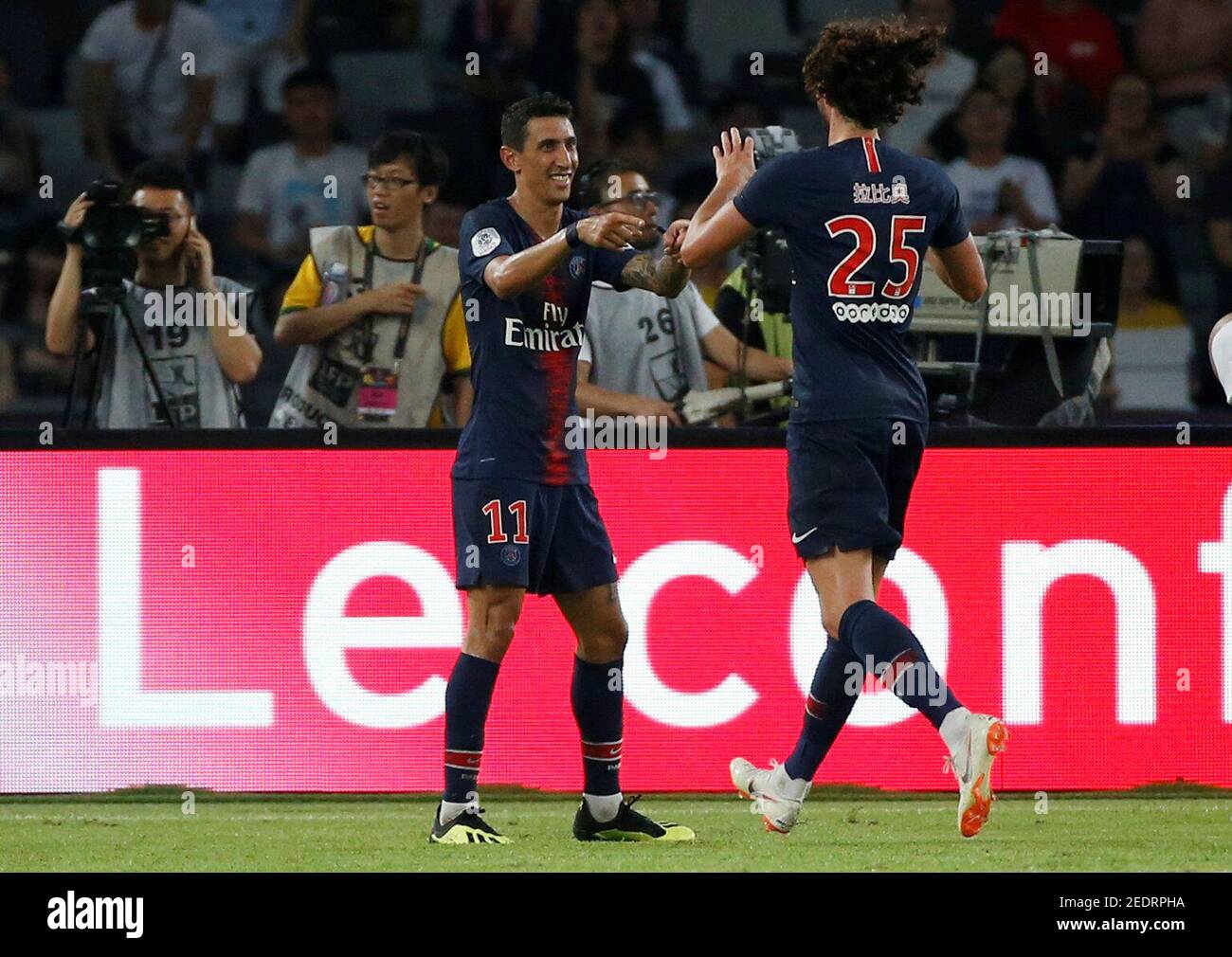 Soccer Football - French Super Cup Trophee des Champions - Paris St Germain v AS Monaco - Shenzhen Universiade Sports Centre, Shenzhen, China - August 4, 2018   Paris St Germain's Angel Di Maria celebrates scoring their fourth goal with Adrien Rabiot   REUTERS/Bobby Yip Stock Photo