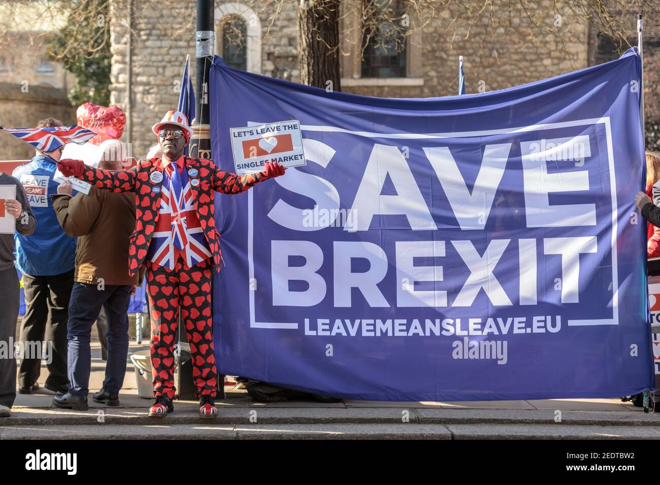 Pro Brexit campaign protesters, including activist Joseph Afrane (m) at a 'Save Brexit' Leave Means Leave rally in Westminster, London Stock Photo