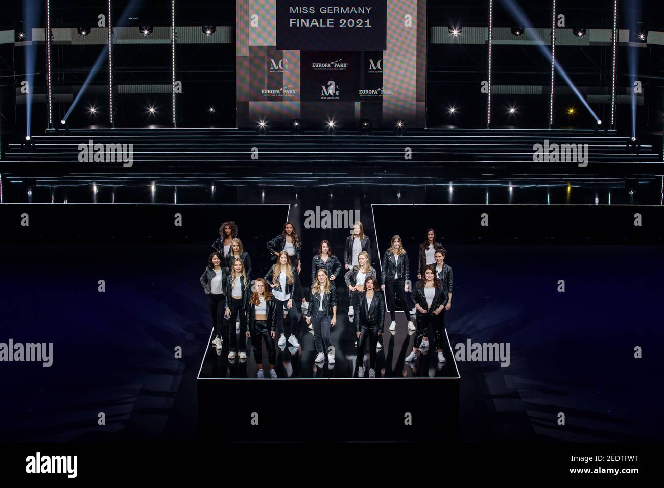 13 February 2021, Baden-Wuerttemberg, Rust: The contestants of the final of the Miss Germany 2021 pageant stand on a stage in front of a large LED wall at Europa-Park. The finalists spend the days before the final together in Rust. Photo: Hauke-Christian Dittrich/dpa Stock Photo