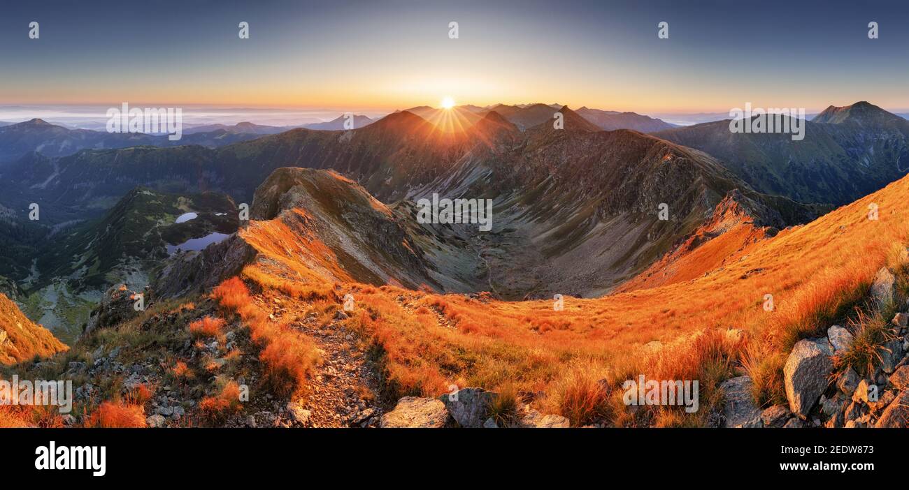 Slovakia mountain landscape at dramatic sunset, Panorama of Rohace Tatras Stock Photo