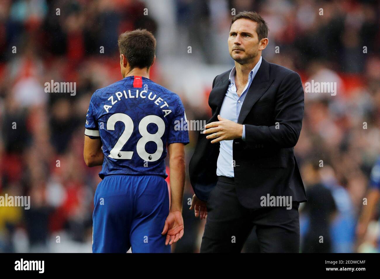 Soccer Football - Premier League - Manchester United v Chelsea - Old Trafford, Manchester, Britain - August 11, 2019  Chelsea manager Frank Lampard and Cesar Azpilicueta look dejected at the end of the match     REUTERS/Phil Noble  EDITORIAL USE ONLY. No use with unauthorized audio, video, data, fixture lists, club/league logos or 'live' services. Online in-match use limited to 75 images, no video emulation. No use in betting, games or single club/league/player publications.  Please contact your account representative for further details. Stock Photo