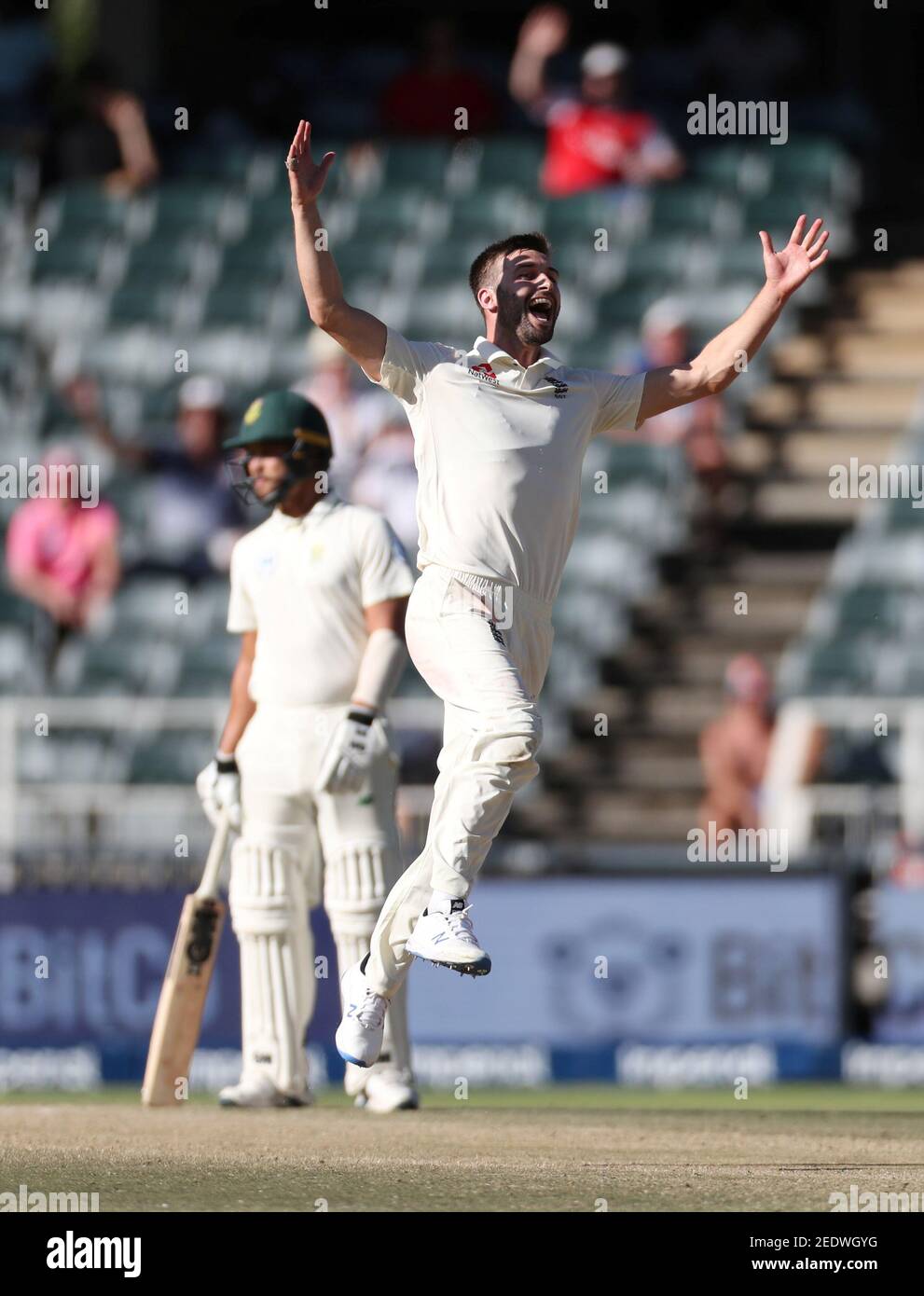 Cricket - South Africa v England - Fourth Test - Imperial Wanderers Stadium, Johannesburg, South Africa - January 27, 2020   England's Mark Wood celebrates taking the wicket of South Africa's Anrich Nortje      REUTERS/Siphiwe Sibeko Stock Photo