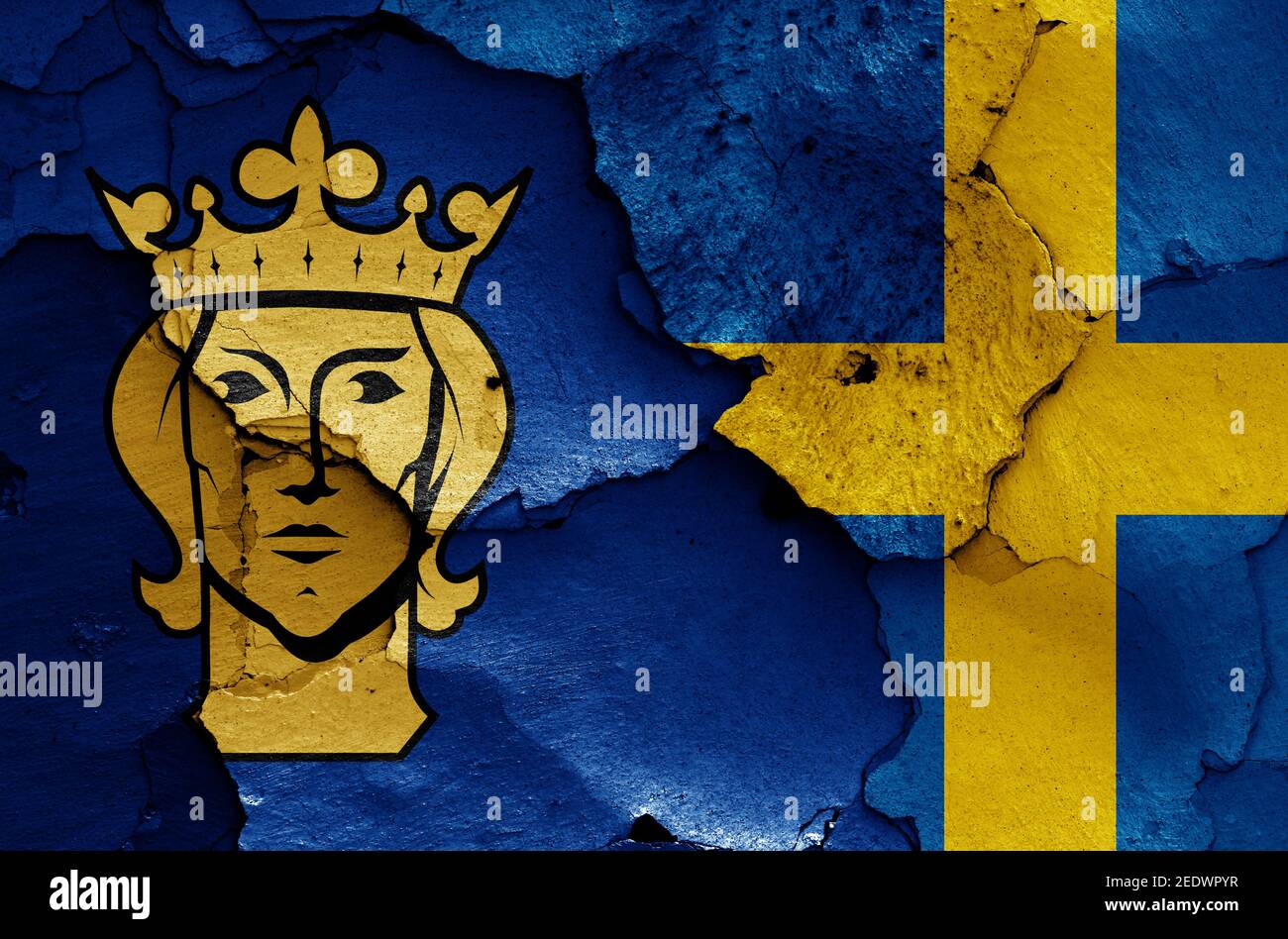 flags of Stockholm and Sweden painted on cracked wall Stock Photo