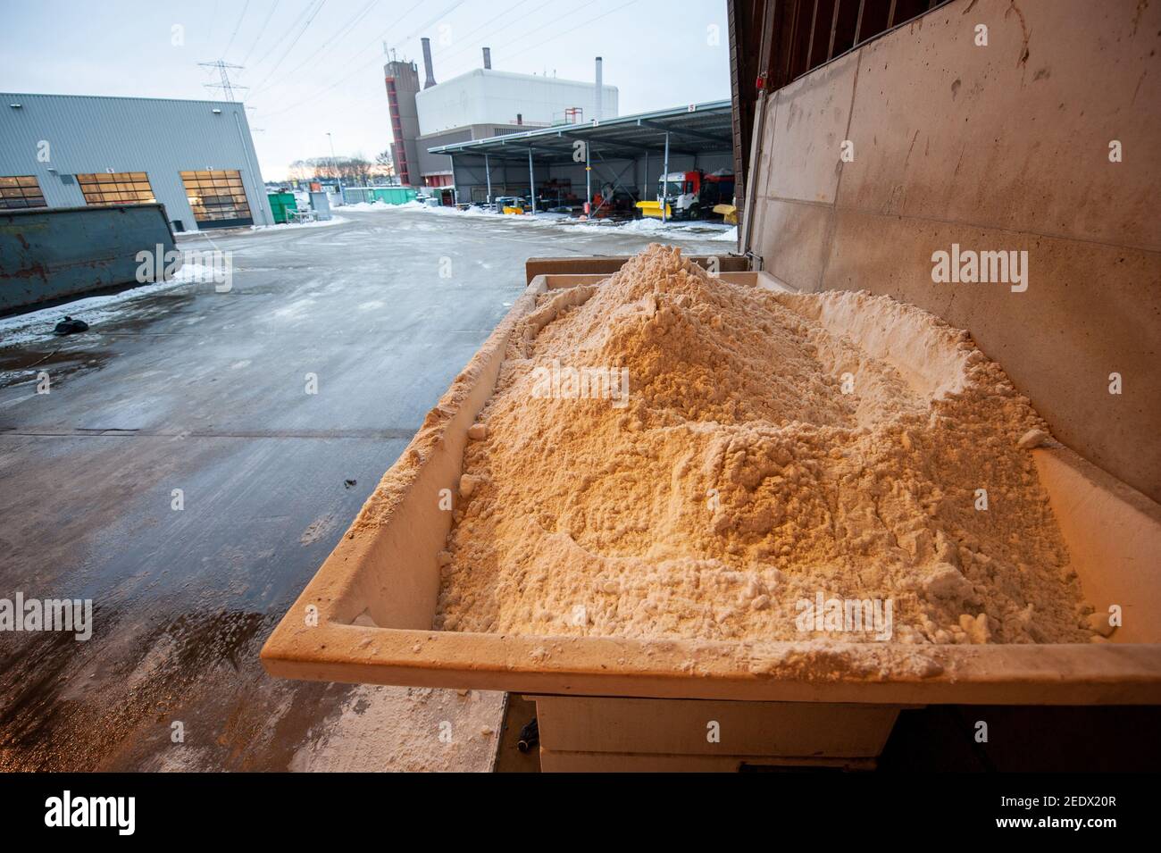Salt in a salt storage used for anti skidding on a road. Stock Photo