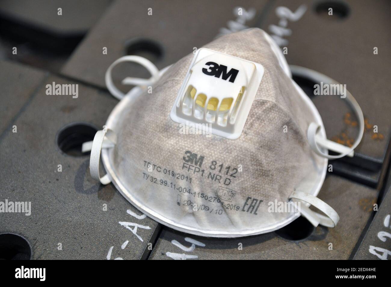 Protective respirator, level FFP2, 3M. Dust after use. Stock Photo