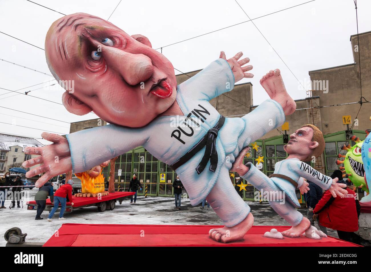 Dusseldorf, Germany. 15 February 2021. Conflict between Putin and Navalny Carnival floats created by German artist Jacques Tilly were presented and later exhibited throughout Dusseldorf as the main carnival parade was cancelled due to the coronavirus pandemic. Credit: Bettina Strenske/Alamy Live News Stock Photo