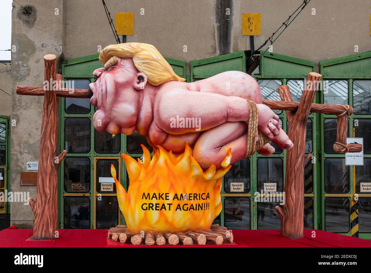 Dusseldorf, Germany. 15 February 2021. Donald Trump - Make America Great Again. Carnival floats created by German artist Jacques Tilly were presented and later exhibited throughout Dusseldorf as the main carnival parade was cancelled due to the coronavirus pandemic. Credit: Bettina Strenske/Alamy Live News Stock Photo