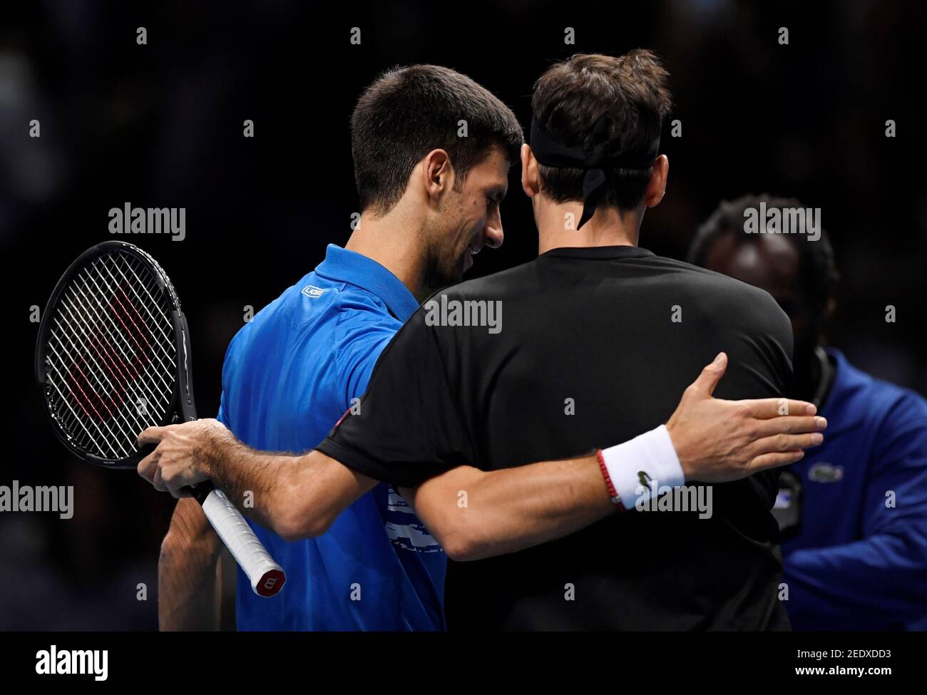 Tennis - ATP Finals - The O2, London, Britain - November 14, 2019  Switzerland's Roger Federer hugs Serbia's Novak Djokovic after winning  their group stage match Action Images via Reuters/Tony O'Brien Stock Photo  - Alamy