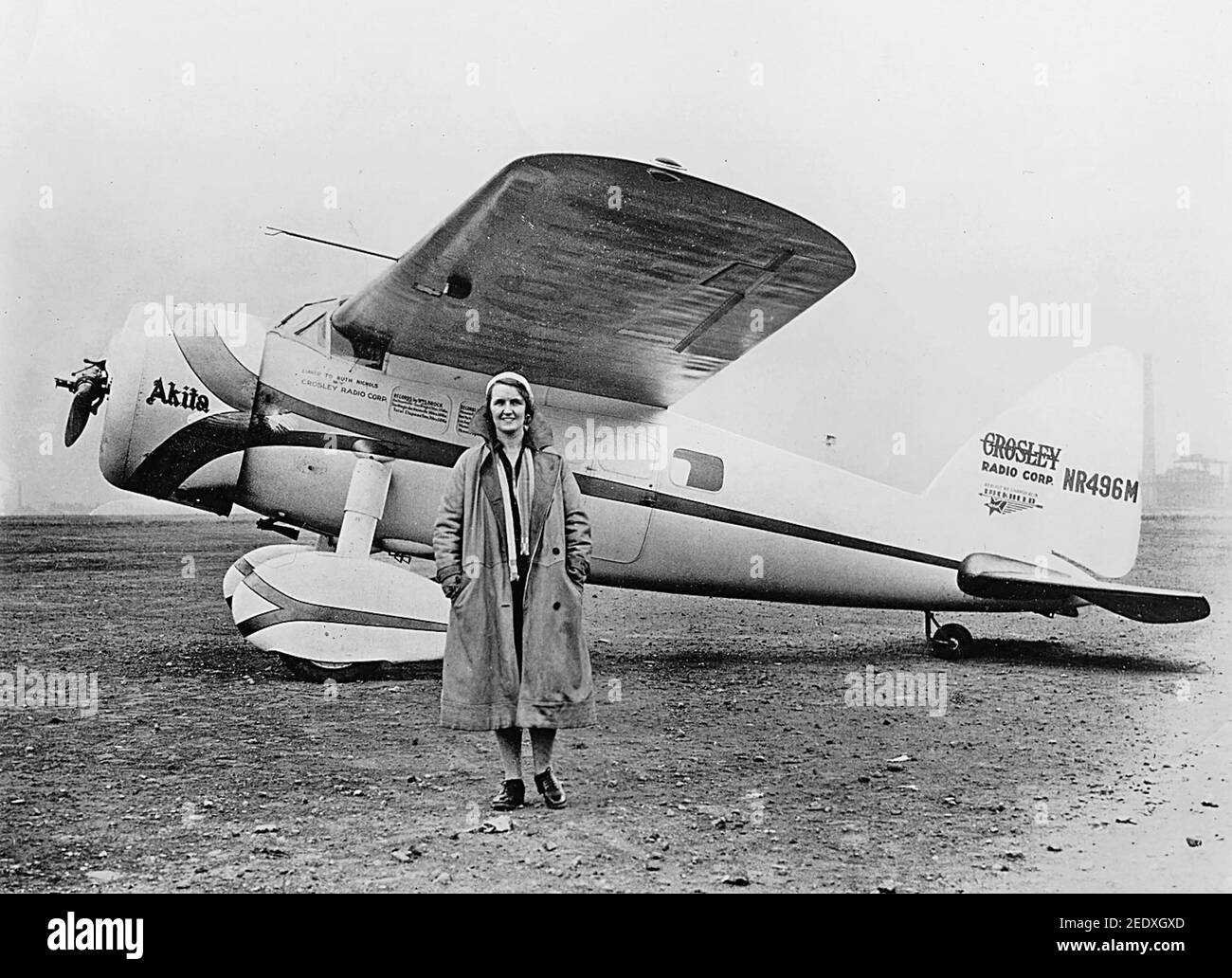 RUTH NICHOLS (1901-1960) American aviation pioneer with her 1928 Lockheed Vega 5 - NR496M - owned by the founder of the Crosley Radio Corp as noted on the tail. Photo about 1932 Stock Photo