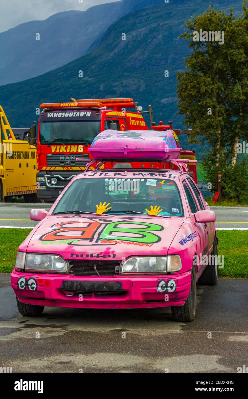 Pink colorful tuned sports car auto exhibition car in Norway. Stock Photo