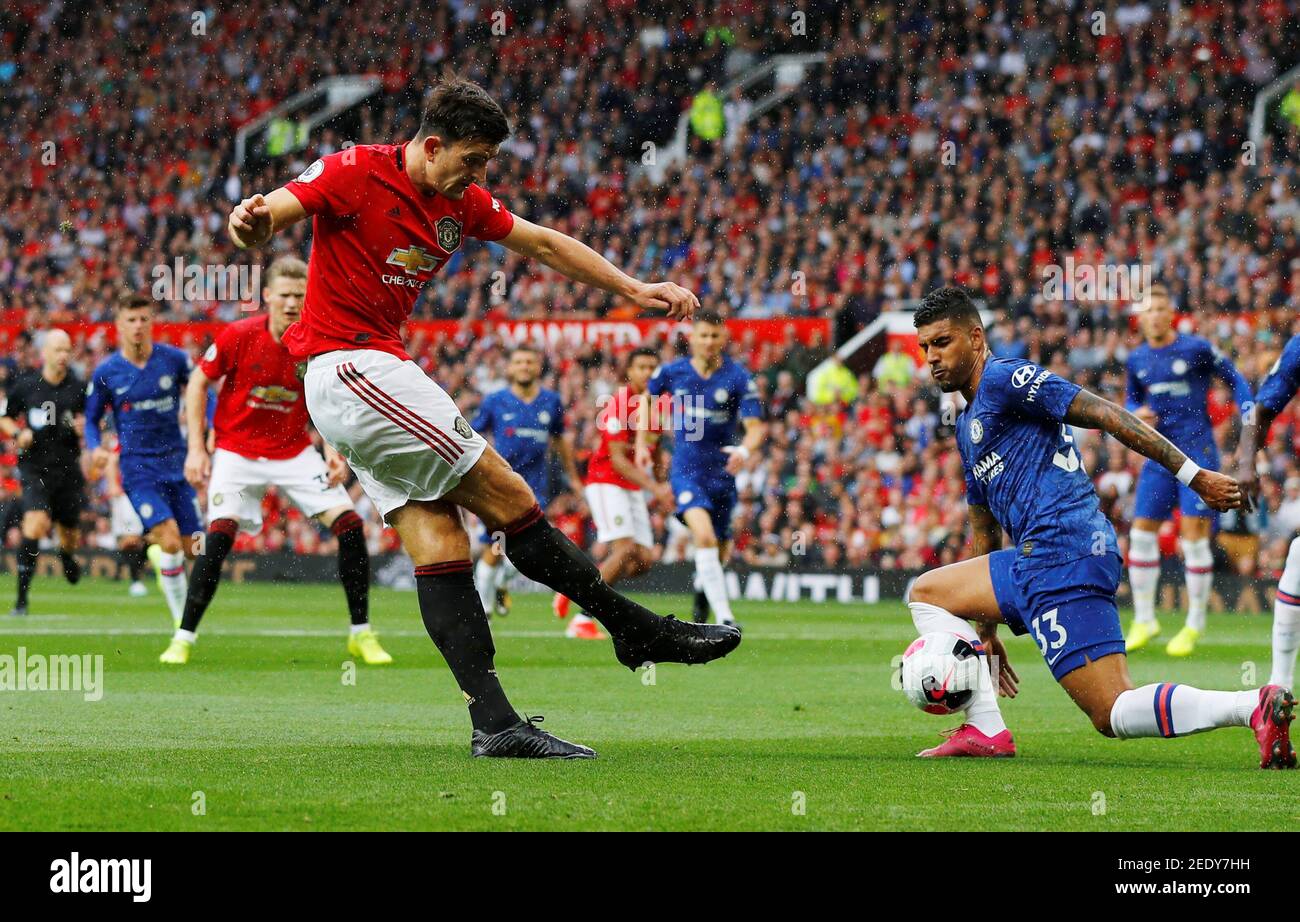 Soccer Football - Premier League - Manchester United v Chelsea - Old Trafford, Manchester, Britain - August 11, 2019  Manchester United's Harry Maguire in action with Chelsea's Emerson Palmieri   REUTERS/Phil Noble  EDITORIAL USE ONLY. No use with unauthorized audio, video, data, fixture lists, club/league logos or 'live' services. Online in-match use limited to 75 images, no video emulation. No use in betting, games or single club/league/player publications.  Please contact your account representative for further details. Stock Photo