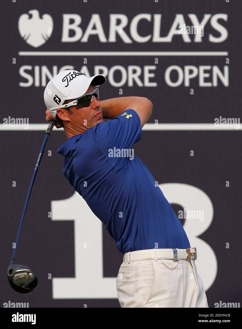 Golf - Barclays Singapore Open - Sentosa Golf Club, Singapore - 10/11/11  England's Ross Fisher tees off from the 18th tee on the Serapong course  during the first round Mandatory Credit: Action