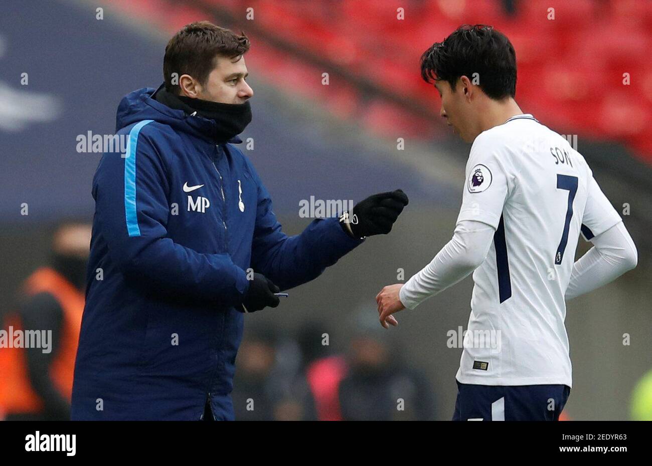 Soccer Football - Premier League - Tottenham Hotspur vs Huddersfield Town - Wembley Stadium, London, Britain - March 3, 2018   Tottenham's Son Heung-min with manager Mauricio Pochettino    REUTERS/Eddie Keogh    EDITORIAL USE ONLY. No use with unauthorized audio, video, data, fixture lists, club/league logos or 'live' services. Online in-match use limited to 75 images, no video emulation. No use in betting, games or single club/league/player publications.  Please contact your account representative for further details. Stock Photo