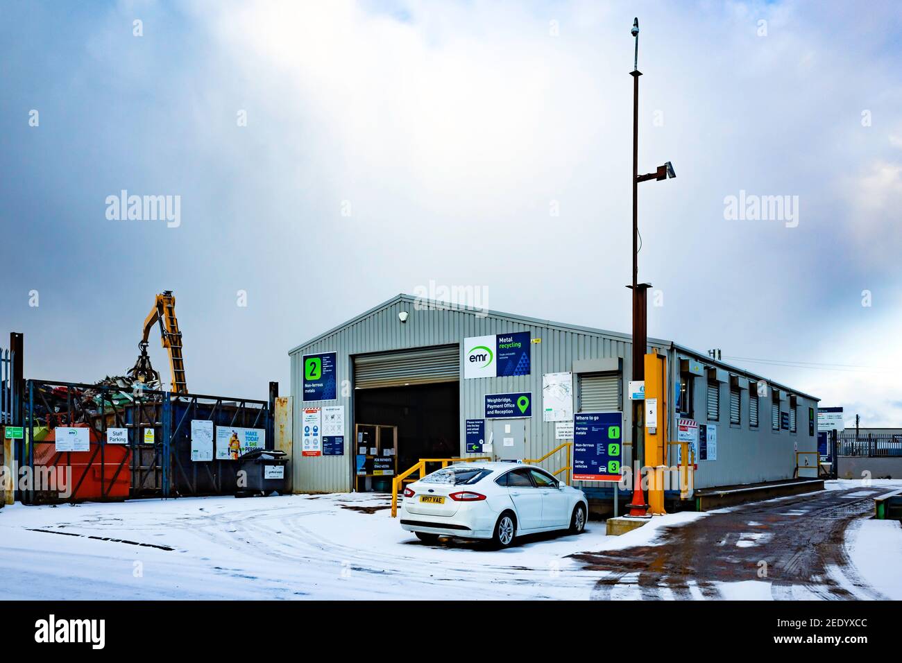 A small metal recycling plant in an industrial site in North Yorkshire able to recycle ferrous and non-ferrous metals in winter Stock Photo