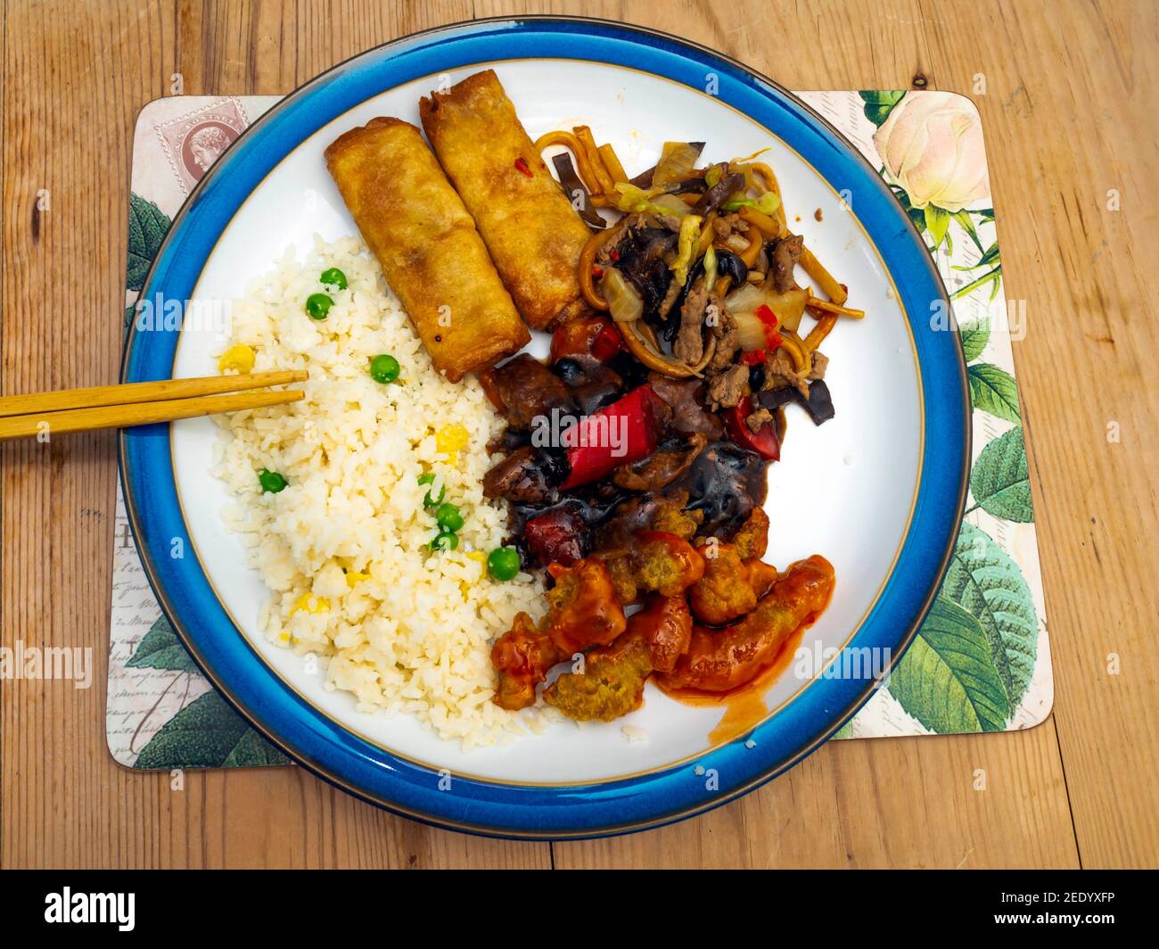 Chinese food from M&S food Year of the Ox box beef in black bean sauce crispy chilli beef Shanghai Beef Noodles egg fried rice vegetable spring rolls Stock Photo