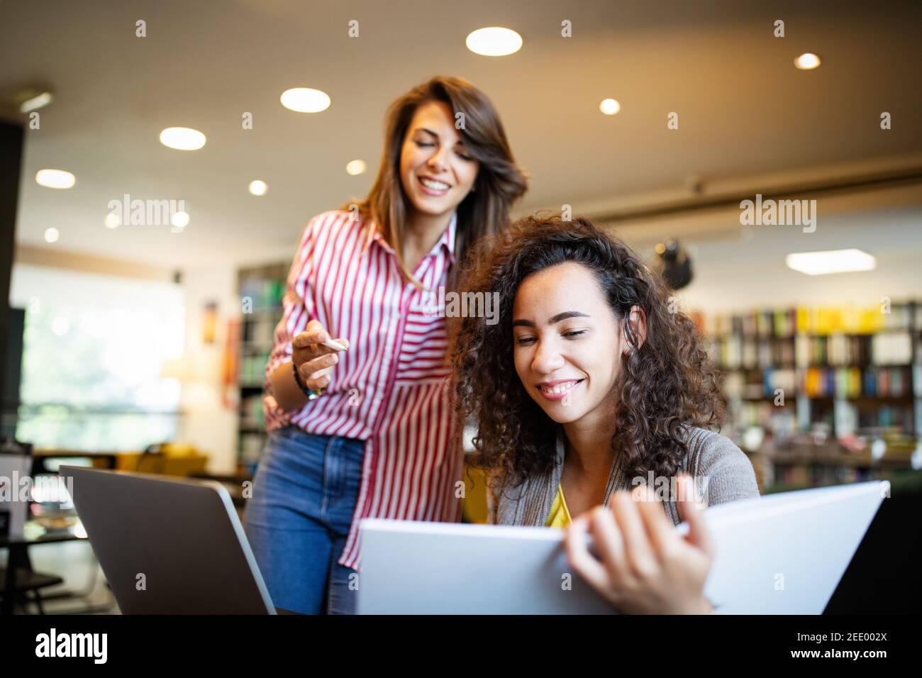 Group of students study at library. Learning and preparing for ...