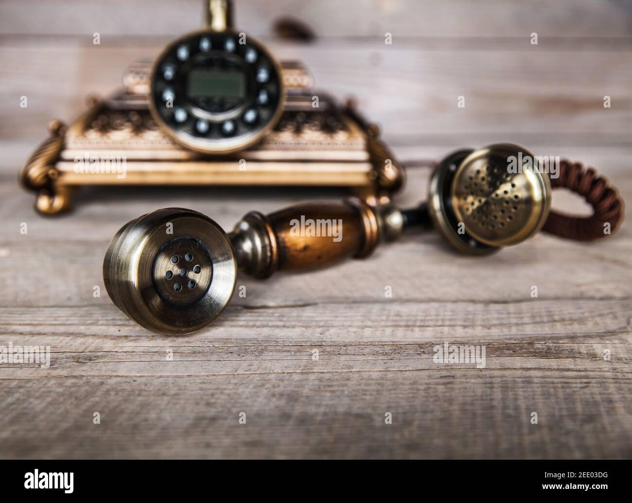 Vintage Telephone on an Old Wood Table and Stock Photo - Alamy