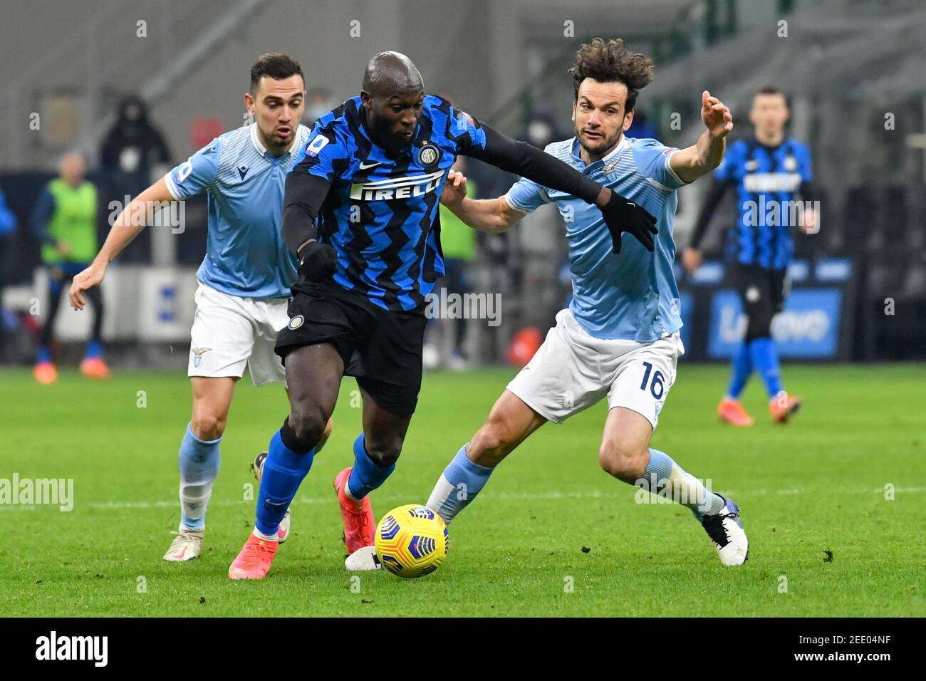 Milano, Italy. 14th Feb, 2021. Romelu Lukaku (9) of Inter Milan and Marco Parolo (16) of Lazio seen in the Serie A match between Inter Milan and Lazio at Giuseppe Meazza in Milano. (Photo Credit: Gonzales Photo/Alamy Live News Stock Photo
