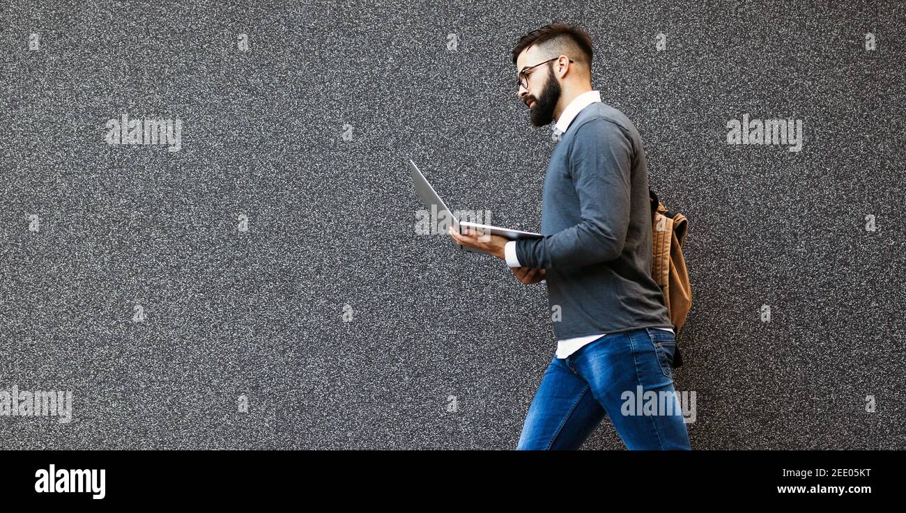 Handsome man outdoor using hi-res stock photography and images - Alamy